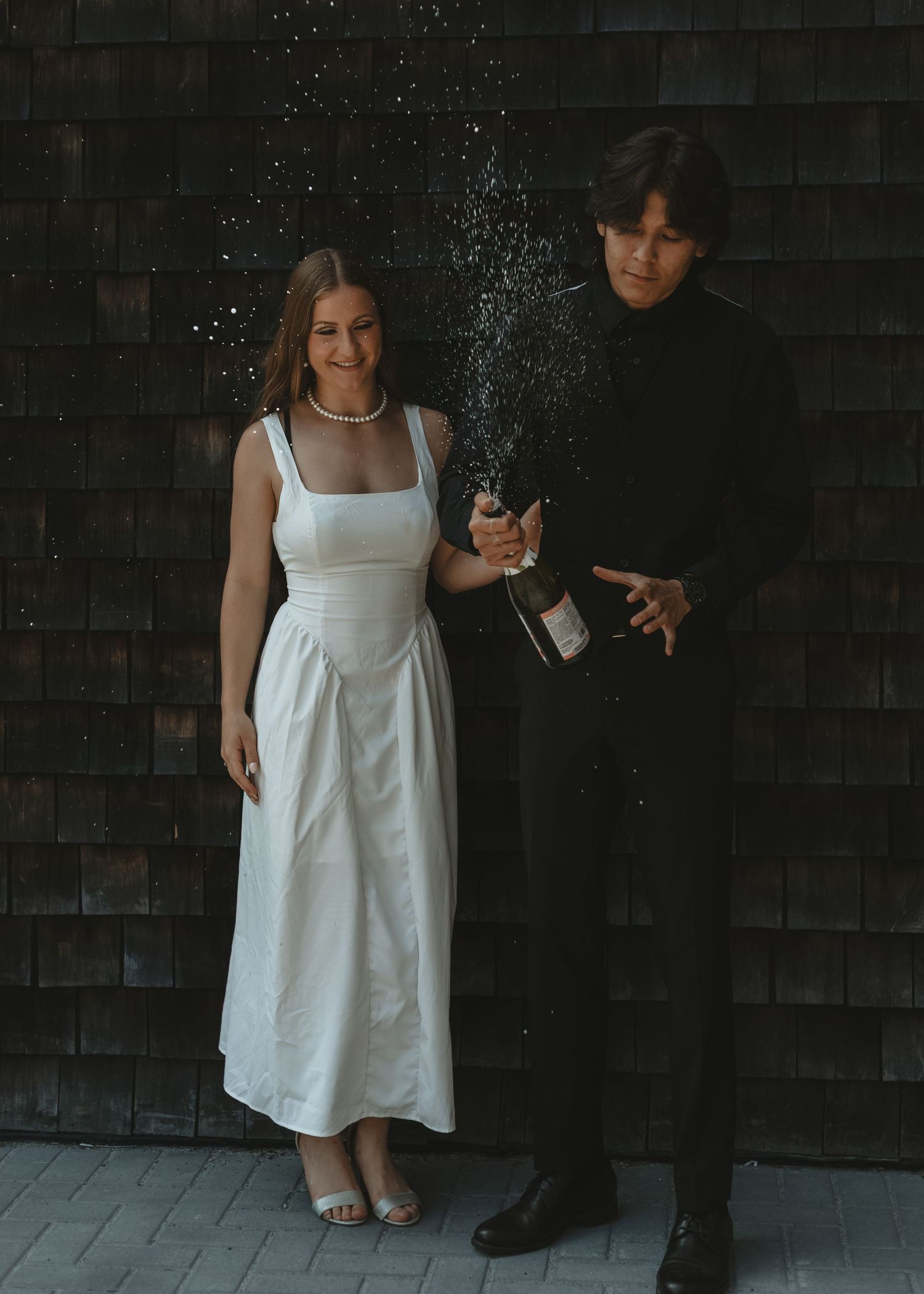 Local Wedding Photographer in Sudbury Ontario captures champagne toast
