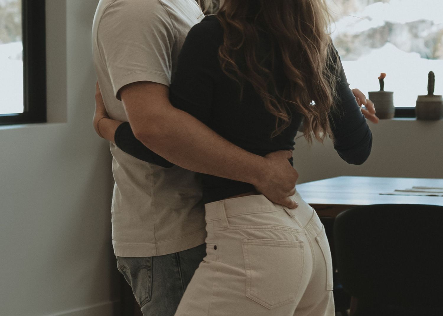 Local Sudbury Ontario Photographer captures beautiful in home engagement session couple dancing