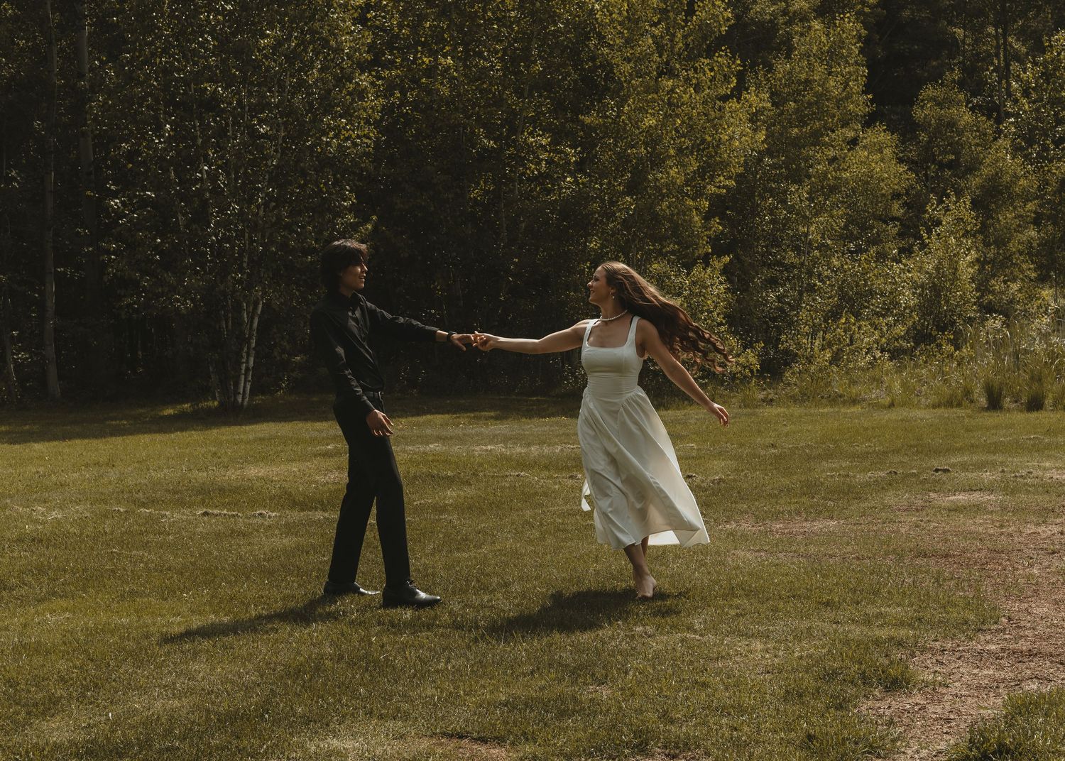 Local Sudbury Photographer captures couple dancing at engagement photoshoot at Fielding Memorial Park in Sudbury Ontario