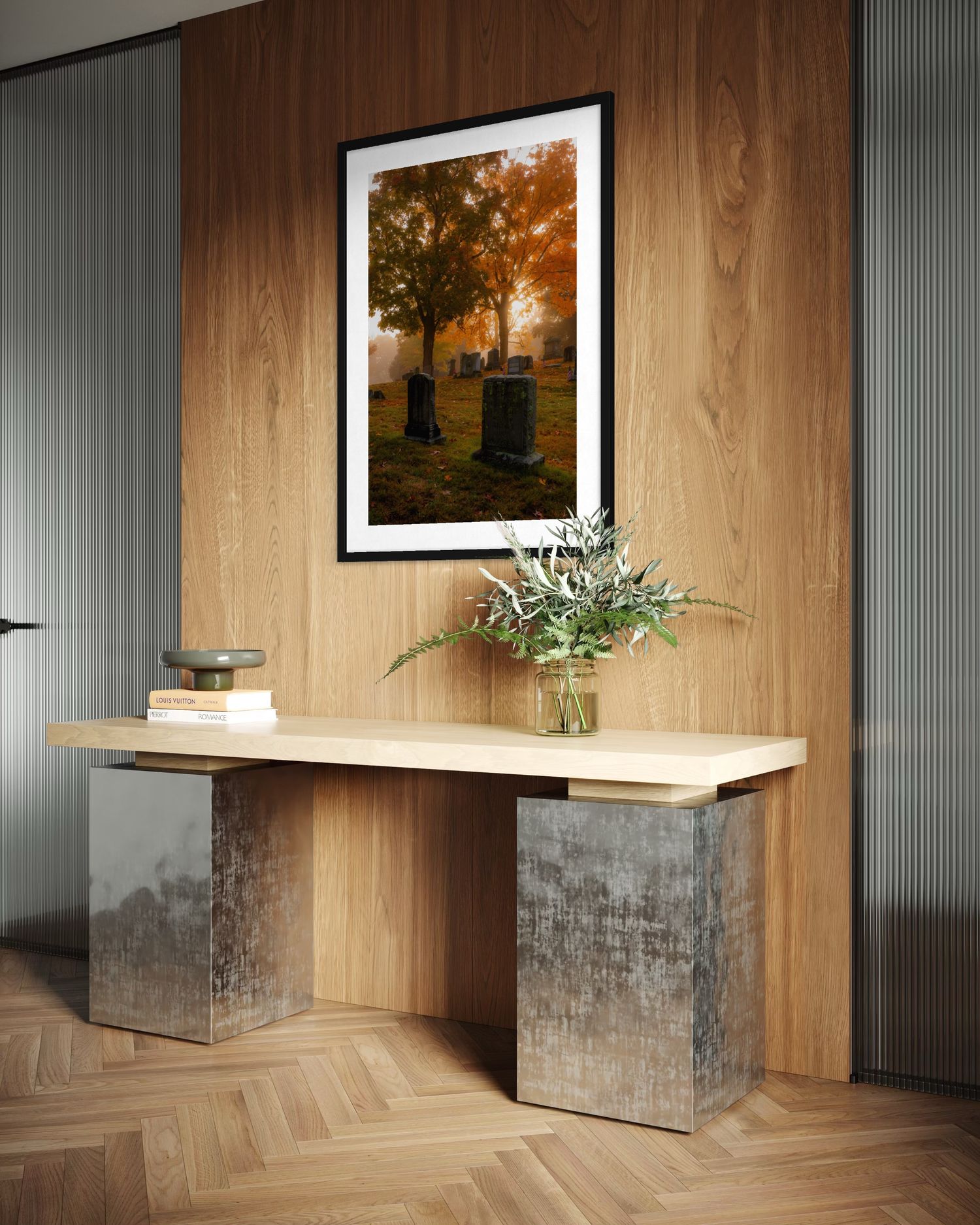 Modern console table with mirrored base and wood top, styled with greenery beneath an autumn cemetery framed art print.