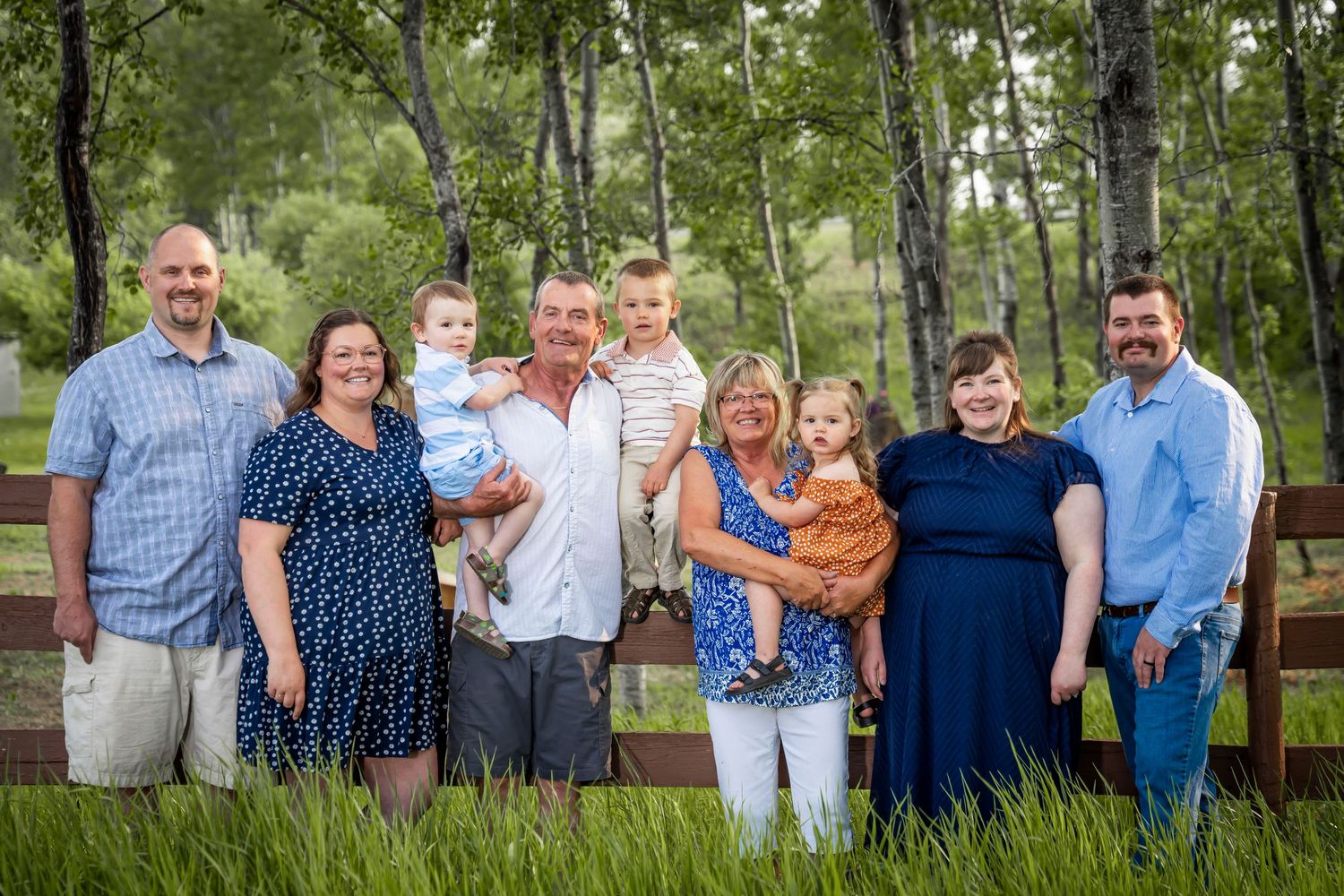 group family on fence