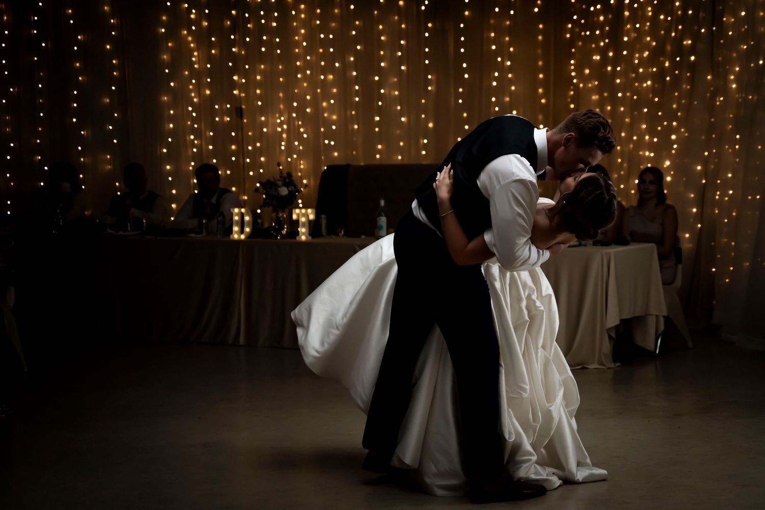 bride and groom dipping in dance
