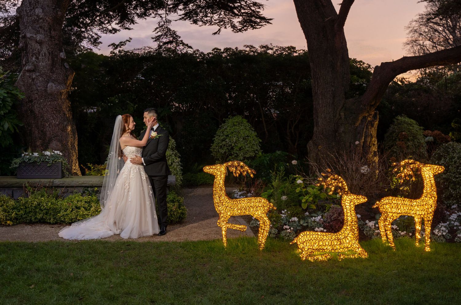 Bride and groom embrace at Clontarf castle Dublin photo by AK wedding photography and videography.