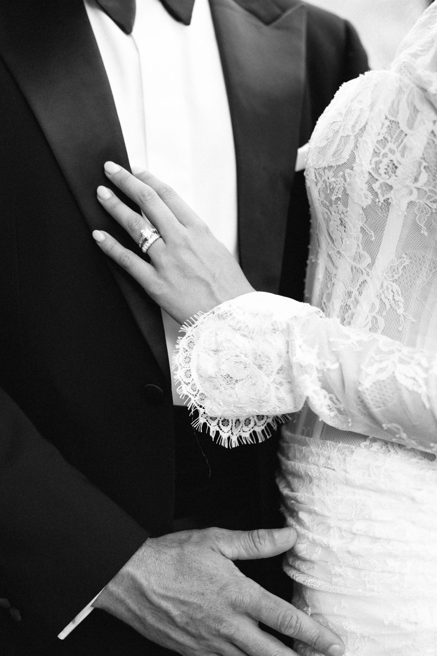 Close-up details of a couple in wedding attire showing intimate moments.