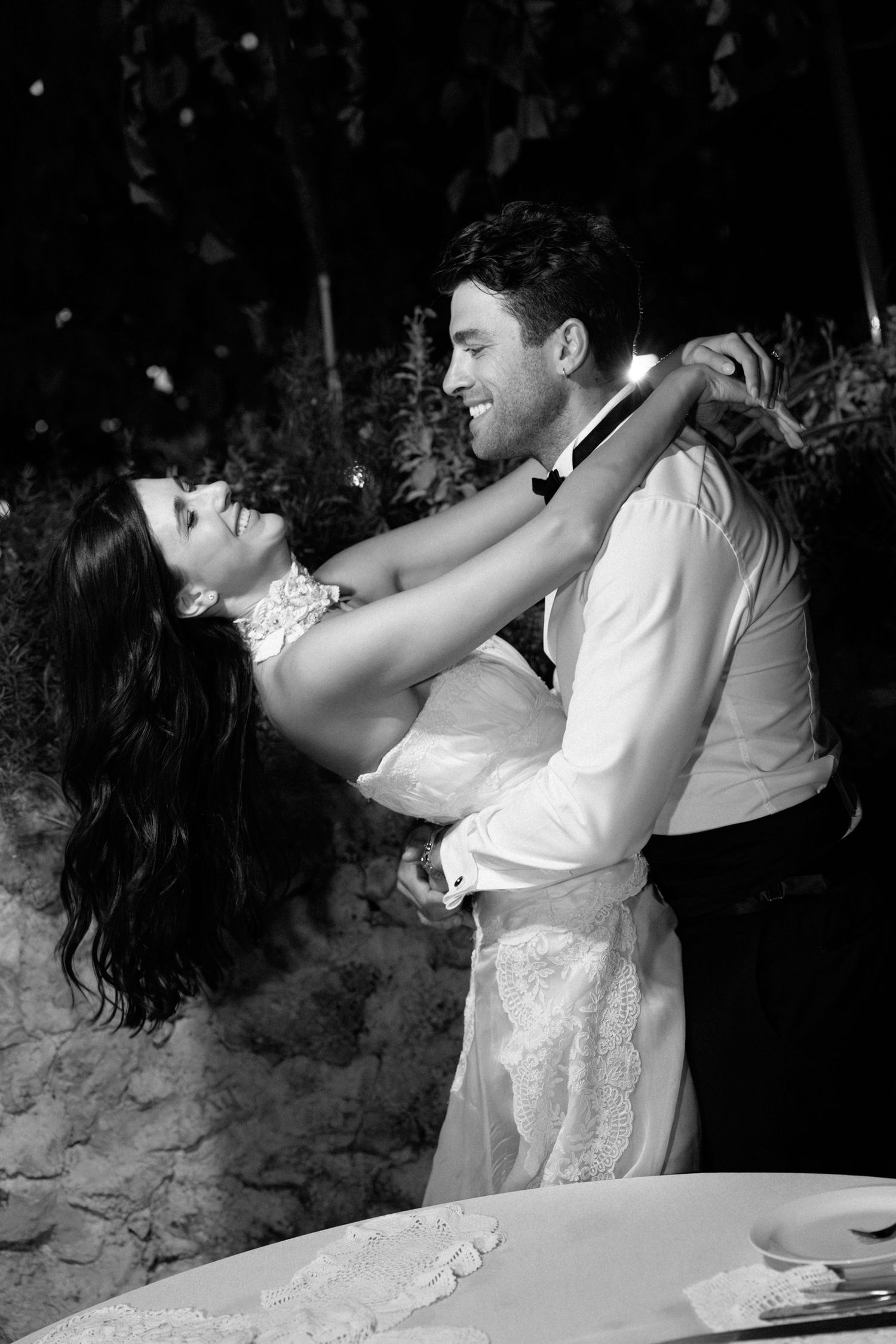 Romantic dance sequence captured in black and white at a wedding celebration. Hvar, Croatia