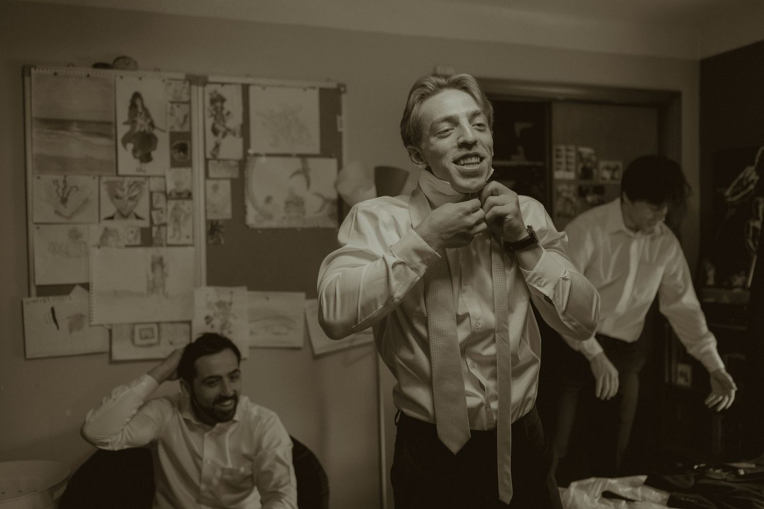 A backyard wedding in Ohio where Lars was getting dressed with his groomsmen.