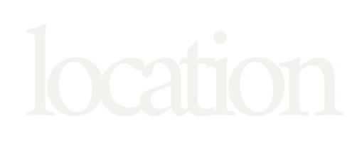 Minimalist 'location' text logo in light beige serif font on white background.