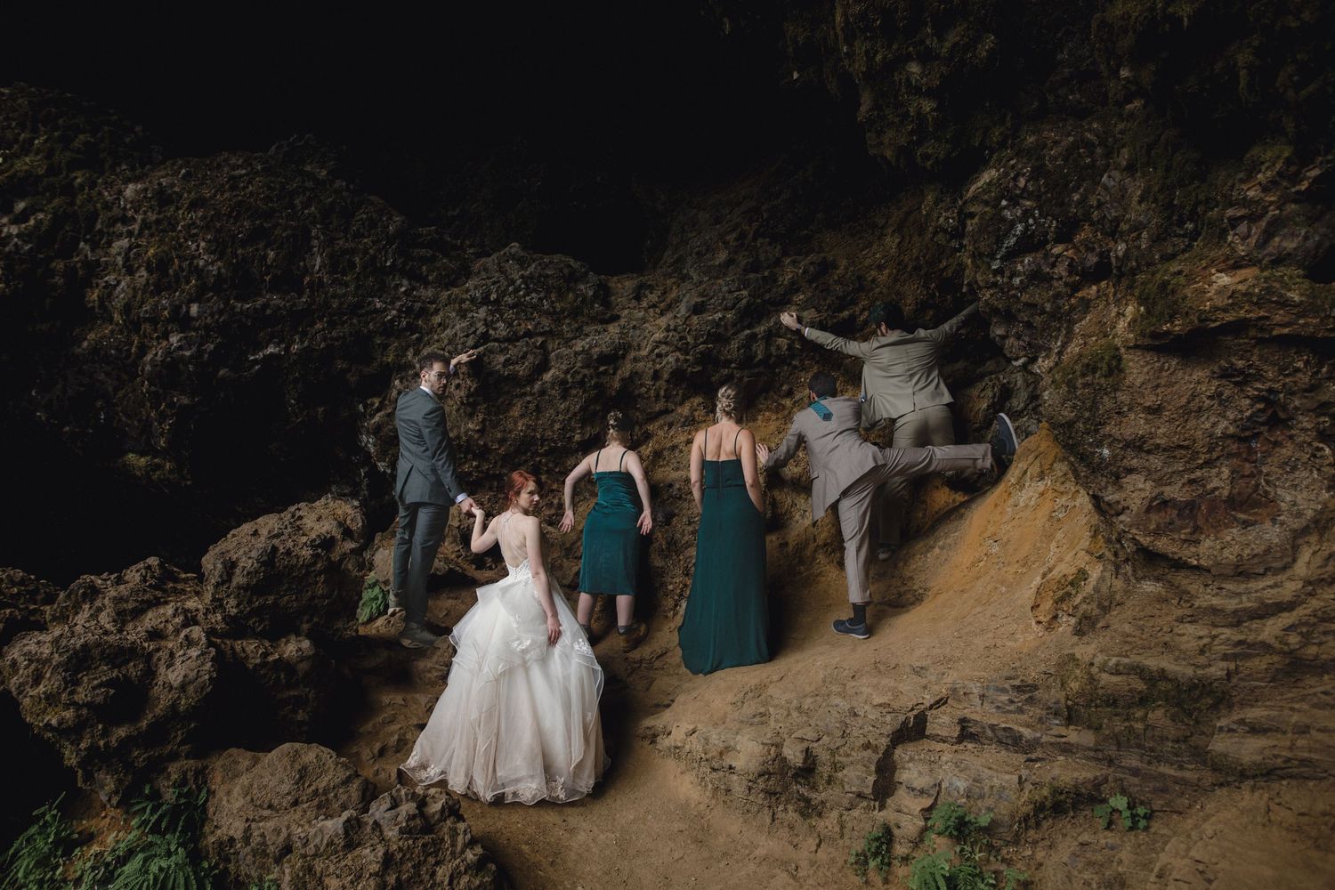 Wedding party poses in a silly way at Silver Falls State Park elopement.