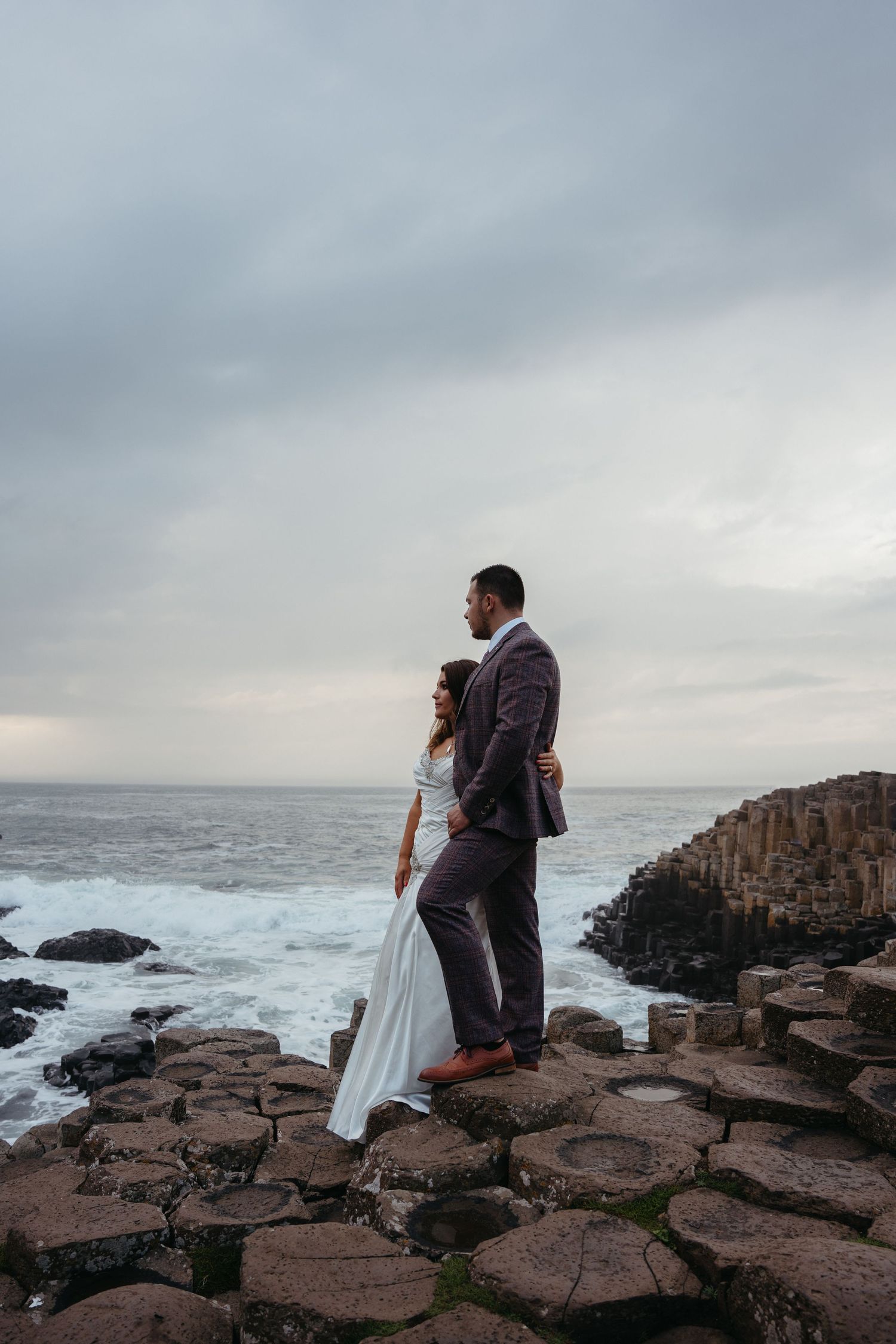 Northern Ireland adventure destination elopement at Giant's Causeway bride and groom on stones