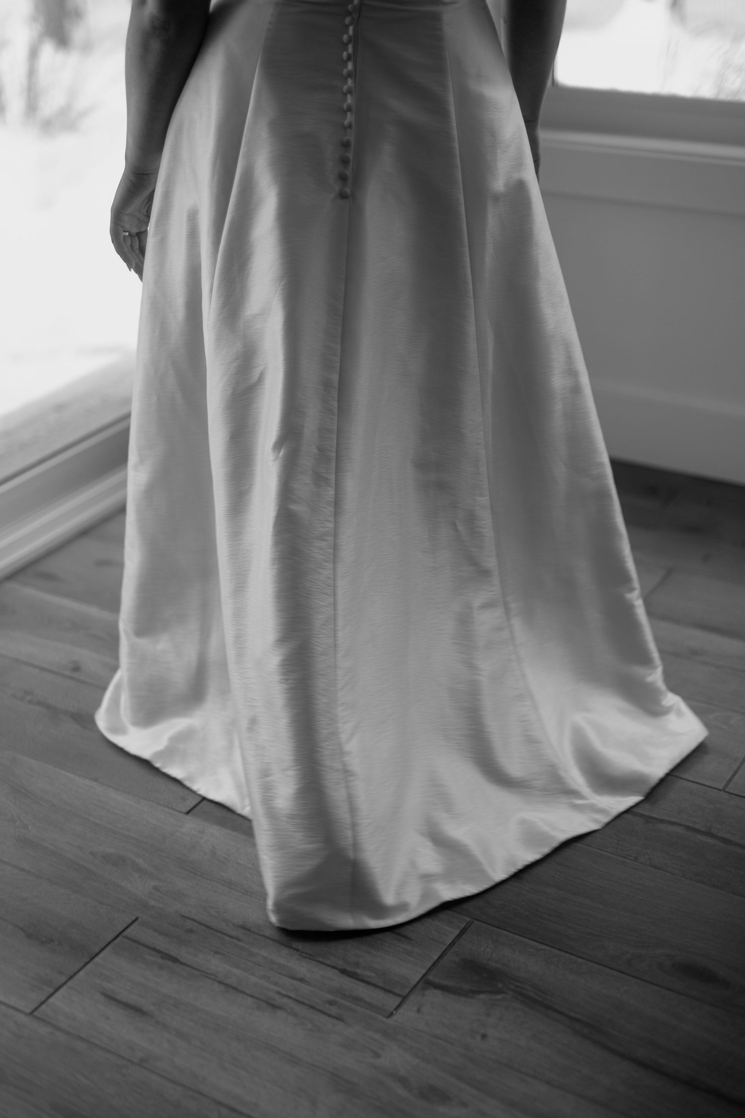 bride back of wedding gown