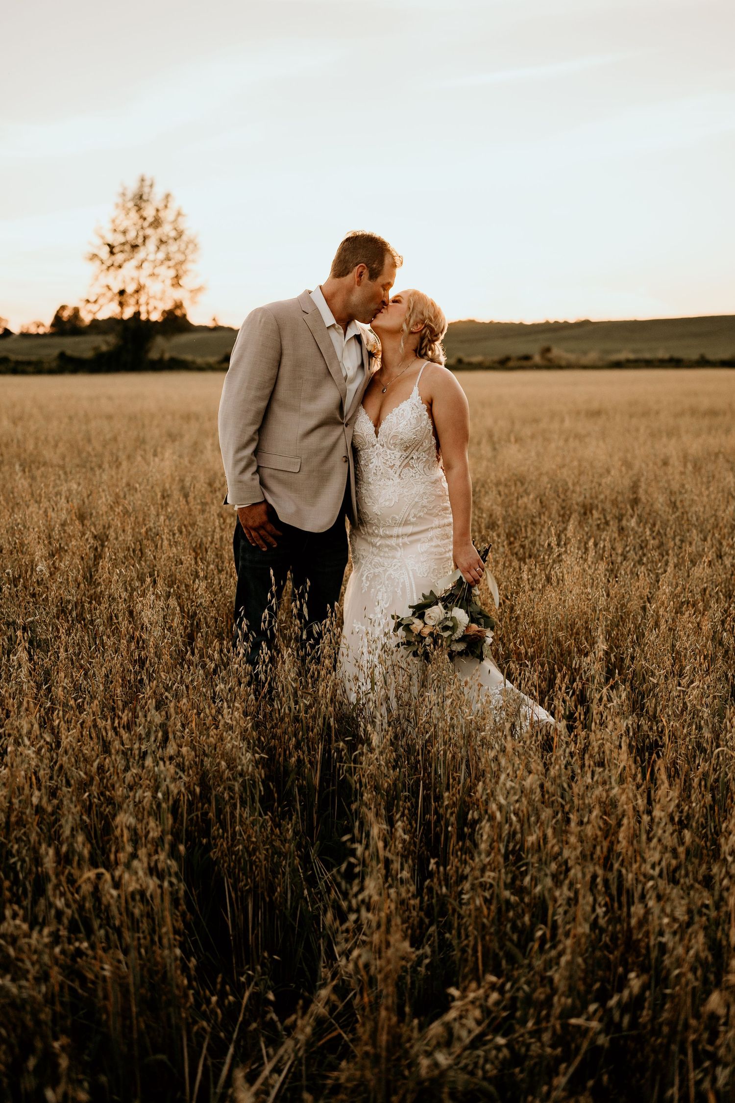 husband and wife wedding day in field