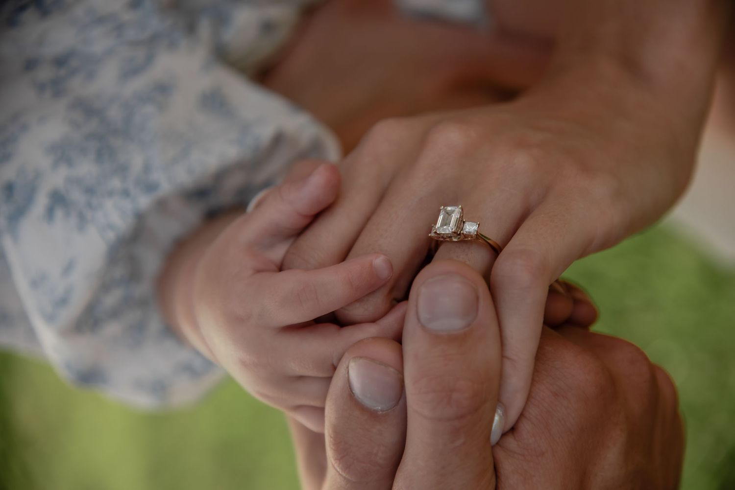 Close-up montage of hands showing engagement rings in natural lighting.