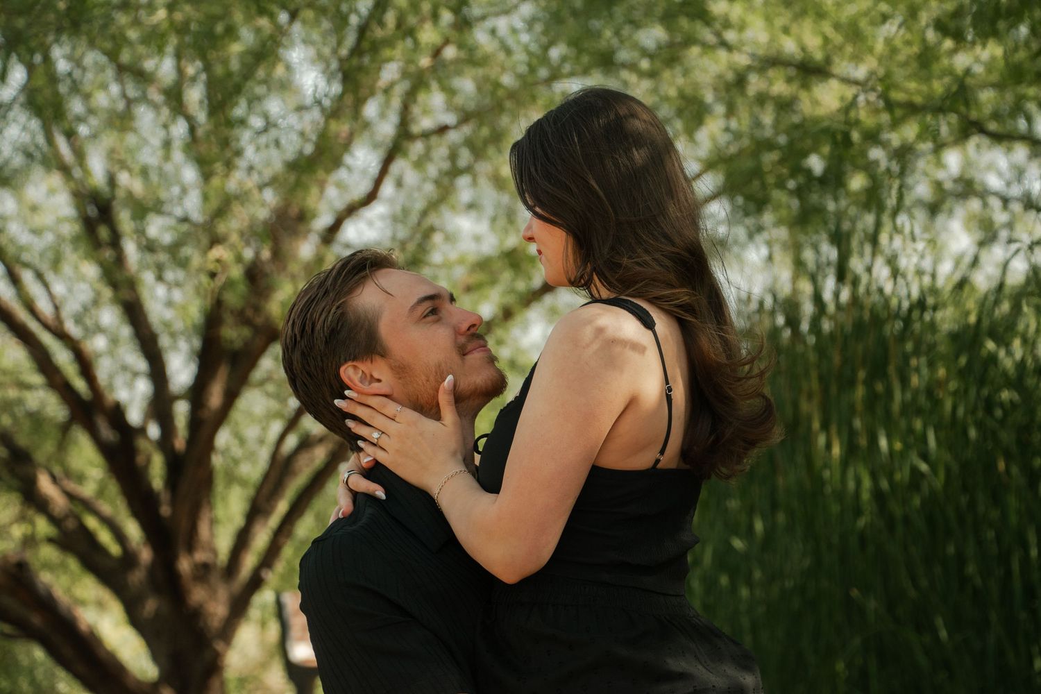 A romantic outdoor photoshoot sequence showing tender moments between a couple.