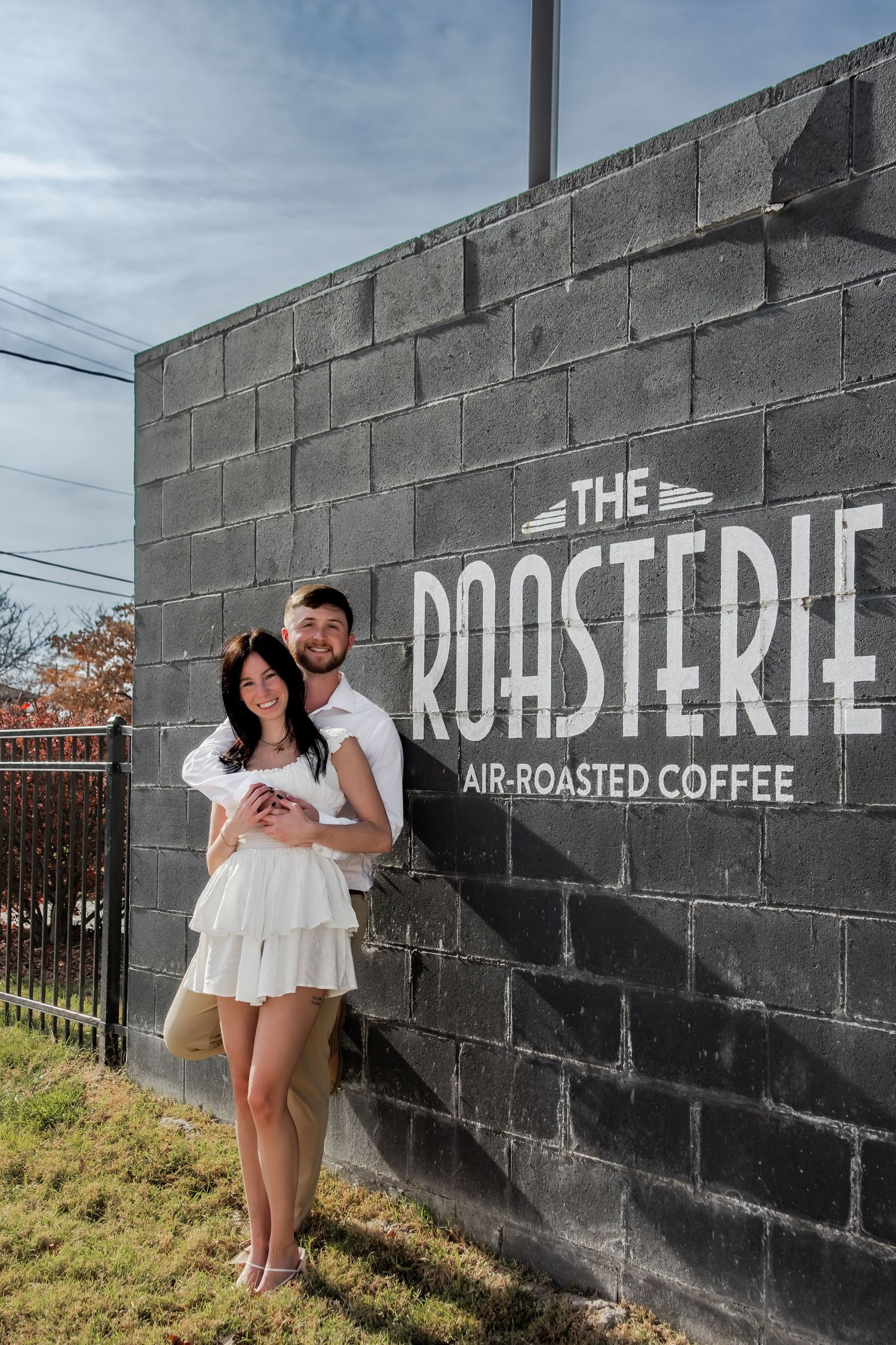 A series of playful photos taken against a black wall with white text reading 'The Roasterie Air-Roasted Coffee'.