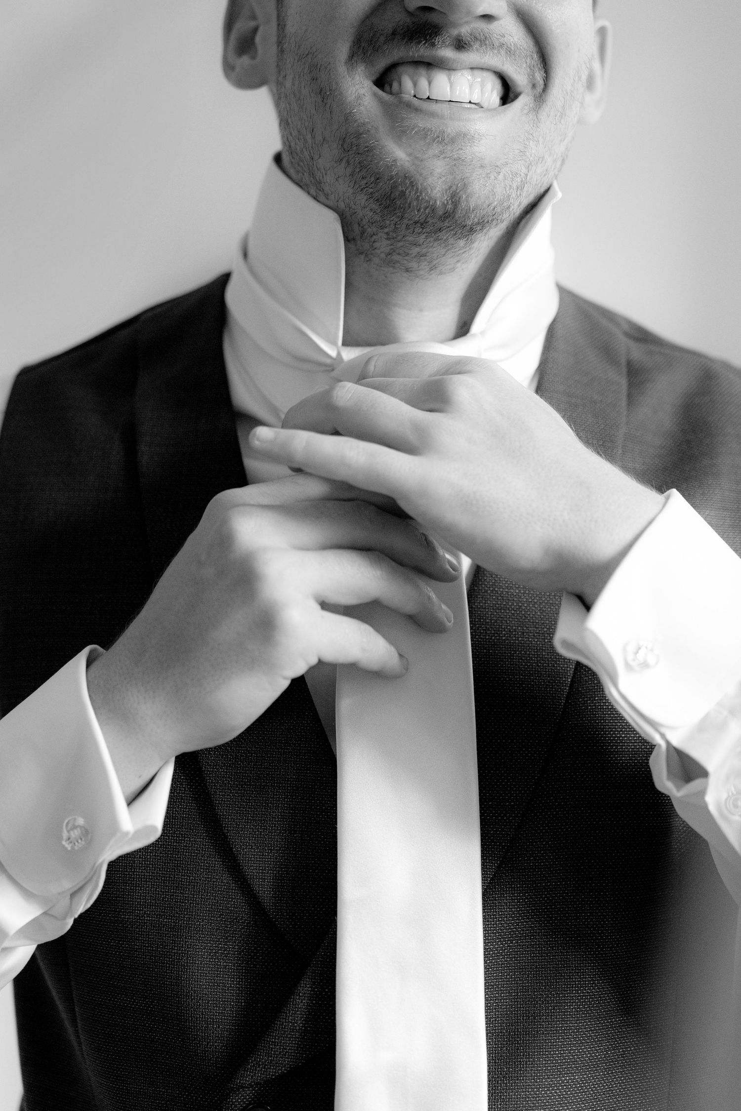 Black and white series showing details of formal attire and expressions.