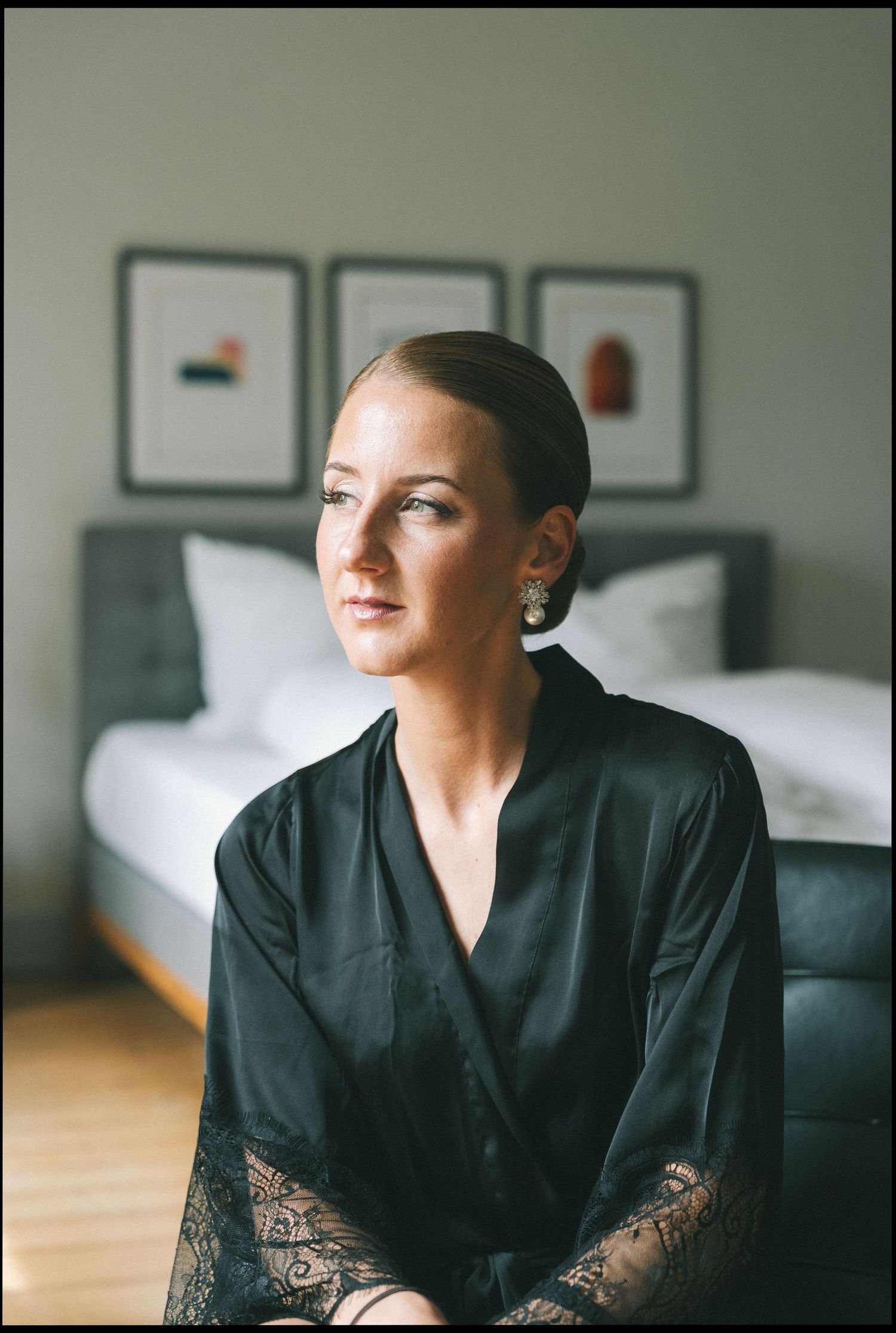 Interior portrait showing elegant preparation in a modern hotel room.