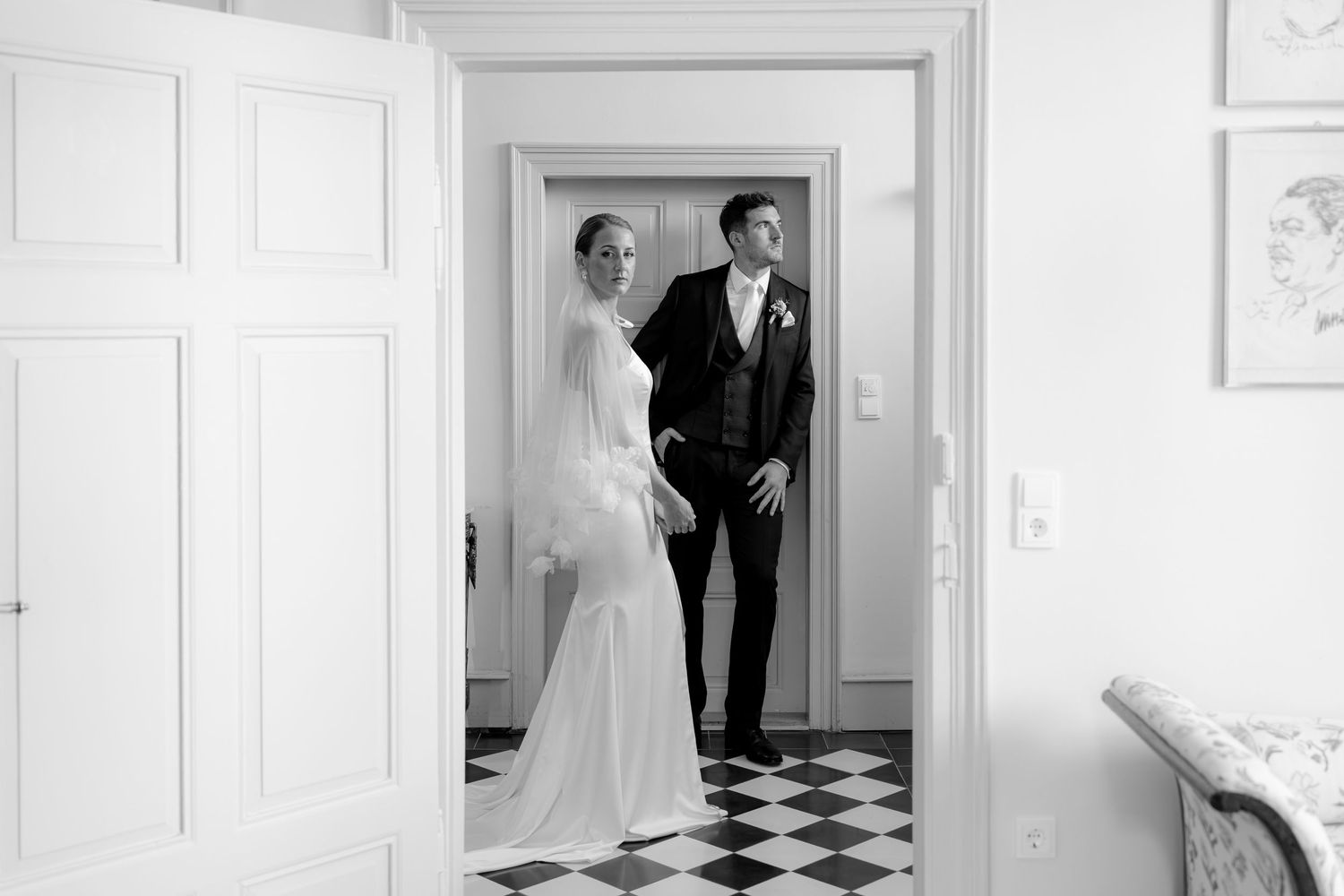 Series of elegant white doorways and hallways in classic interior wedding venue.
