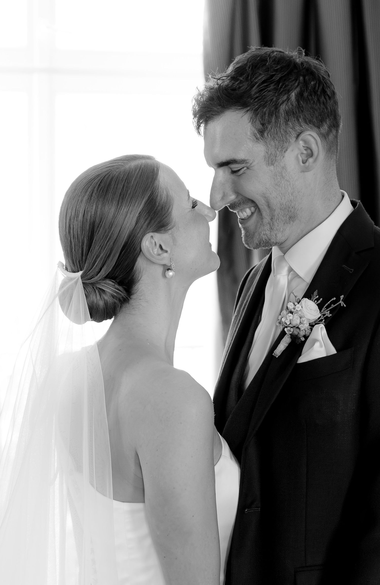 A romantic first kiss sequence between newlyweds at their wedding ceremony.