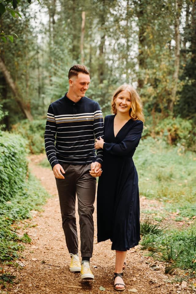 Authentic lifestyle photography of a couple in the forest