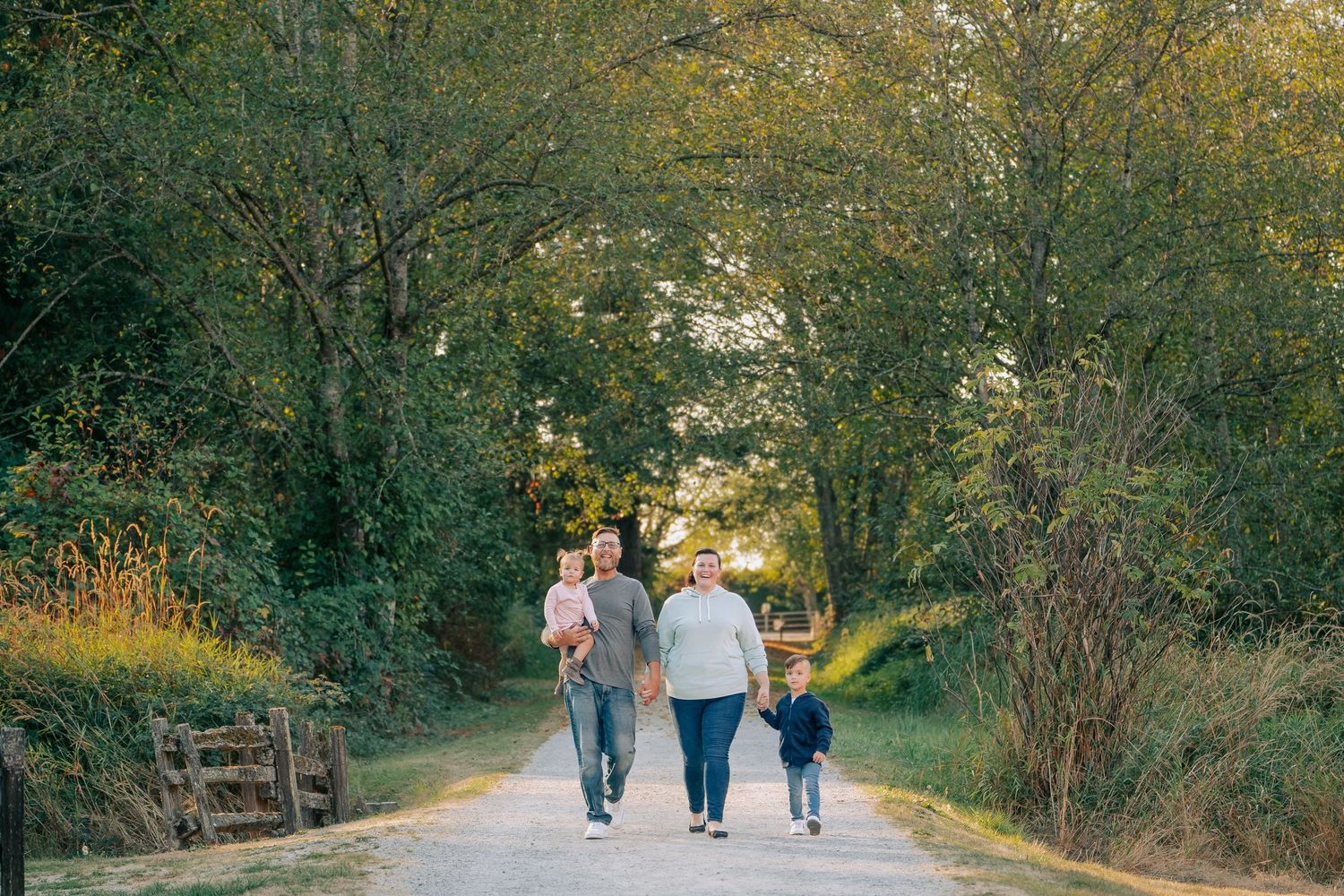 Lifestyle family portraits in a lush forest setting at Campbell Valley Park in Langley, BC.