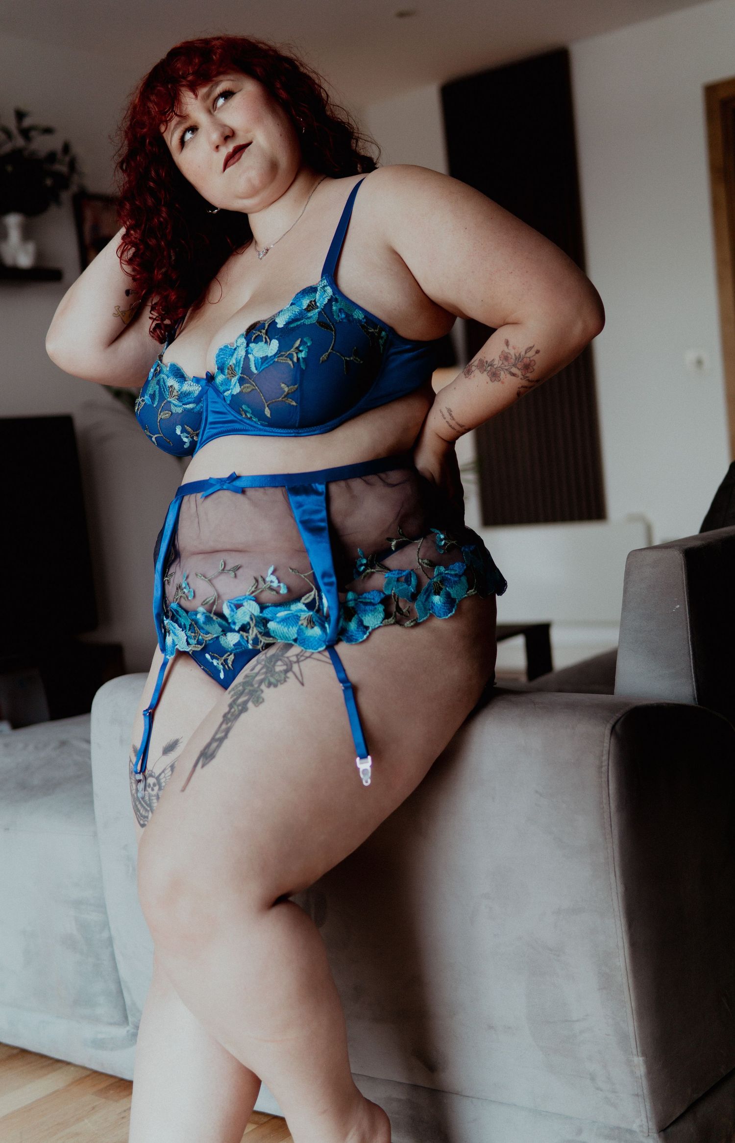 Woman with red hair wearing blue flory lingerie set  Boudoir photography UK Liverpool