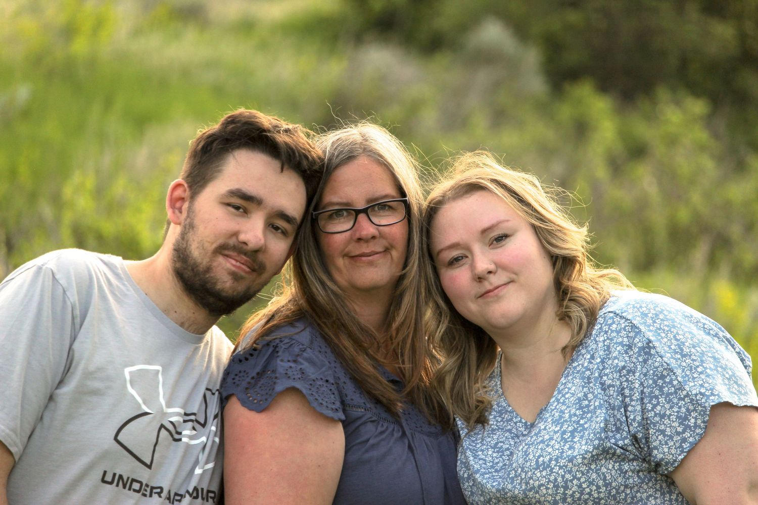 Mom and son/daughter hugging in Lethbridge, AB
