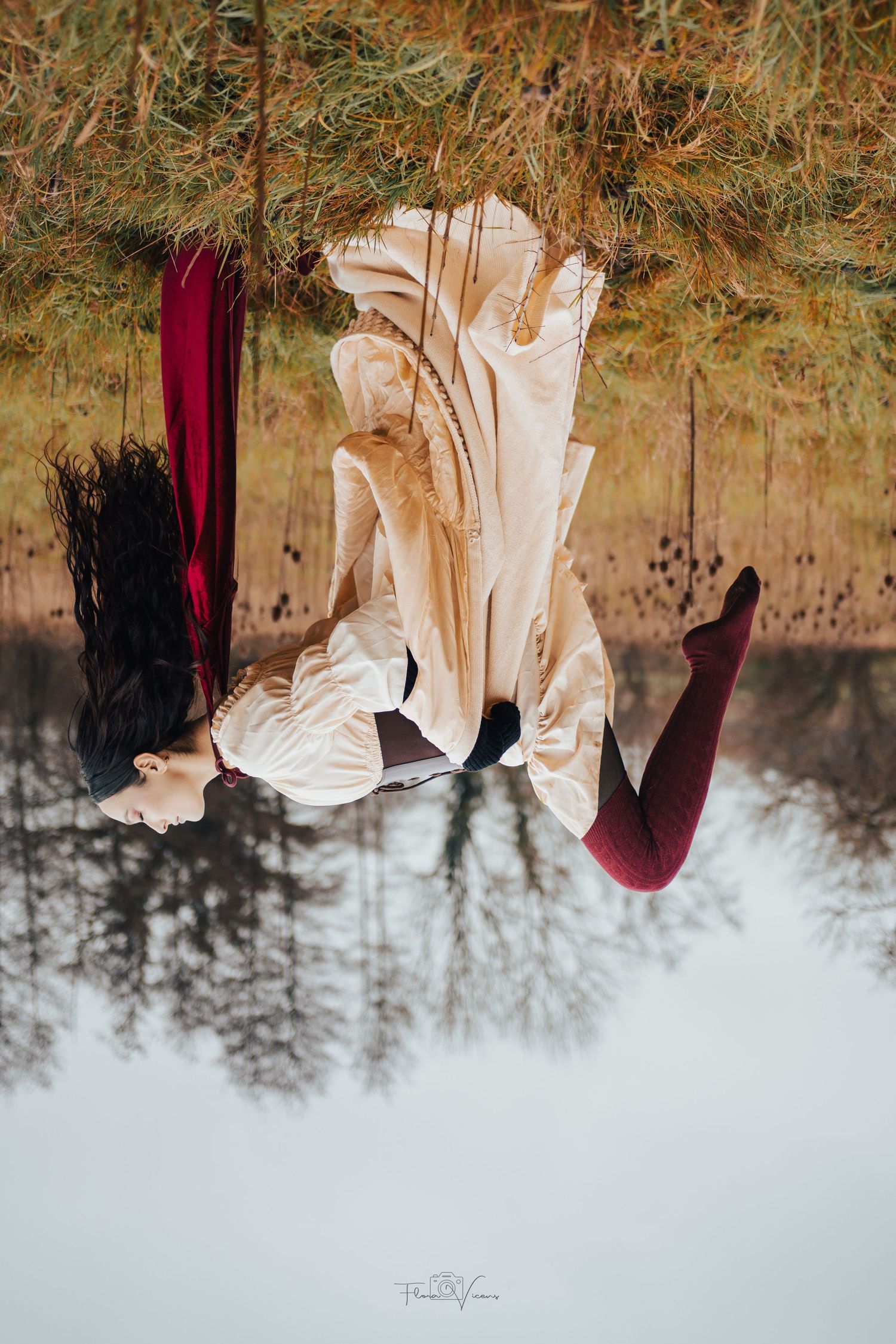 Ethereal outdoor portrait session featuring flowing cream and burgundy dresses.