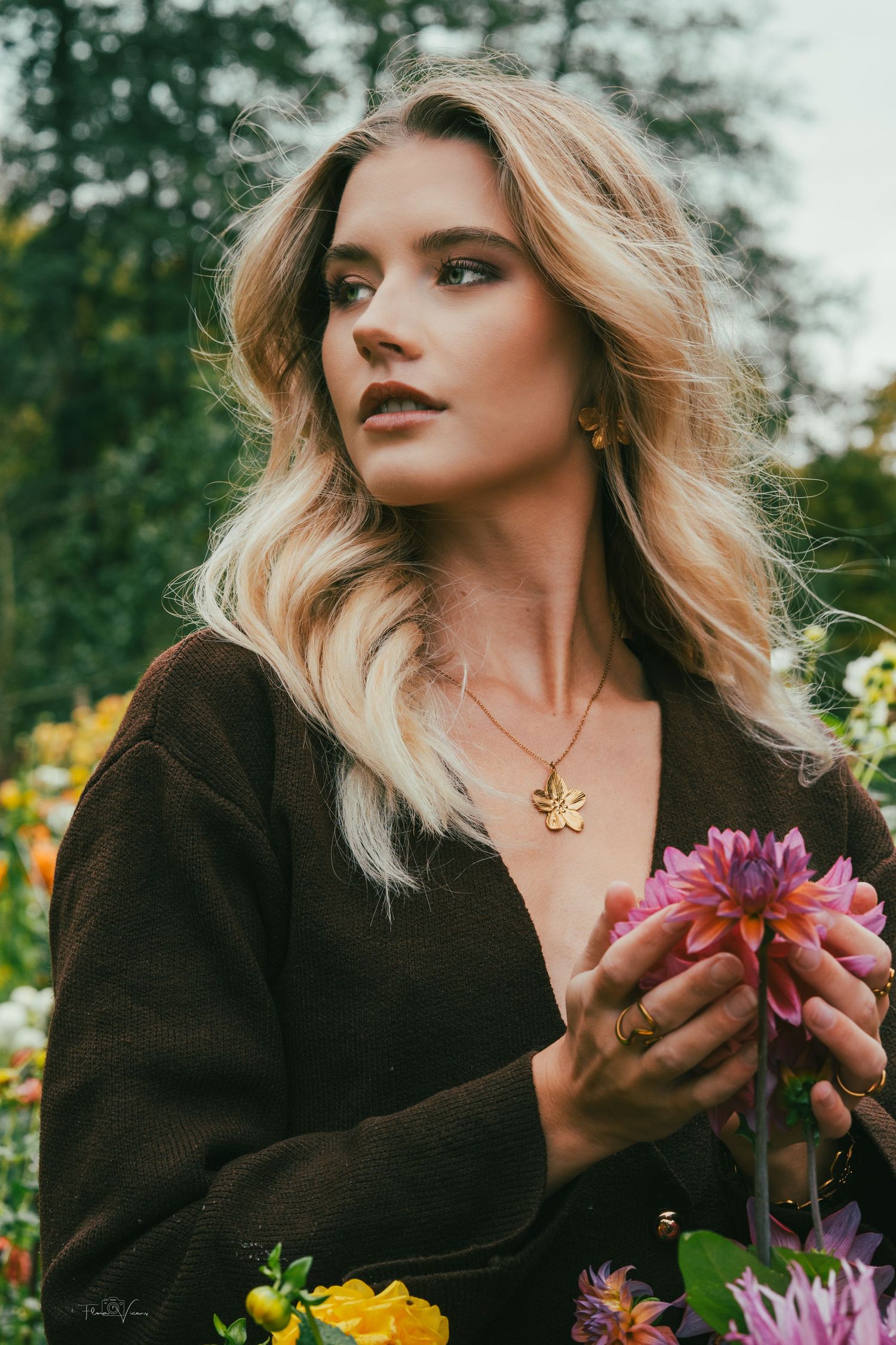 Portrait series with autumn flowers featuring warm tones and dramatic lighting.