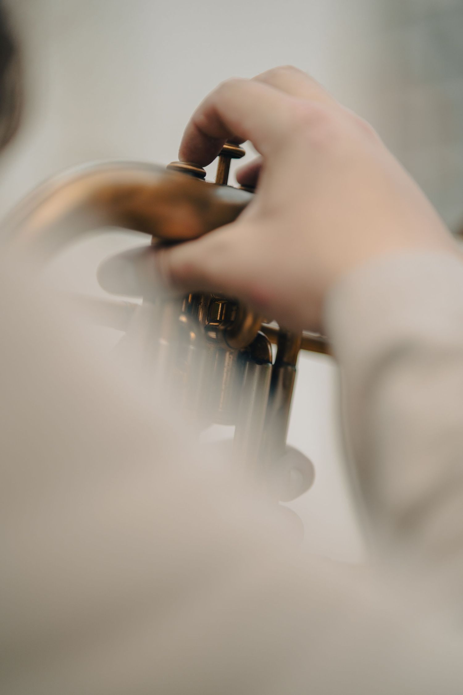 Abstract blurred close-up shot of musical instruments being played.