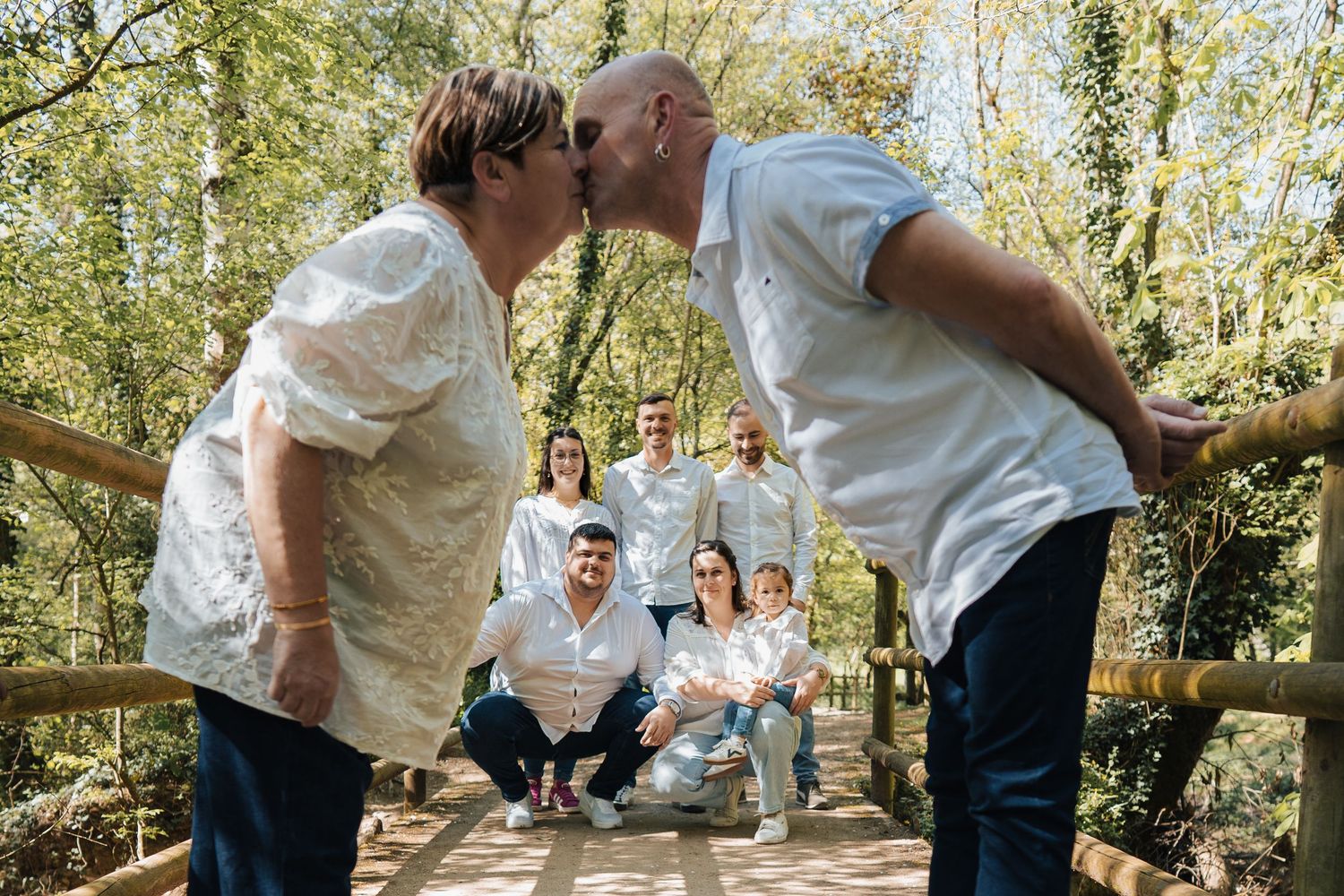 Romantic outdoor wedding moments captured in a series of natural forest settings.