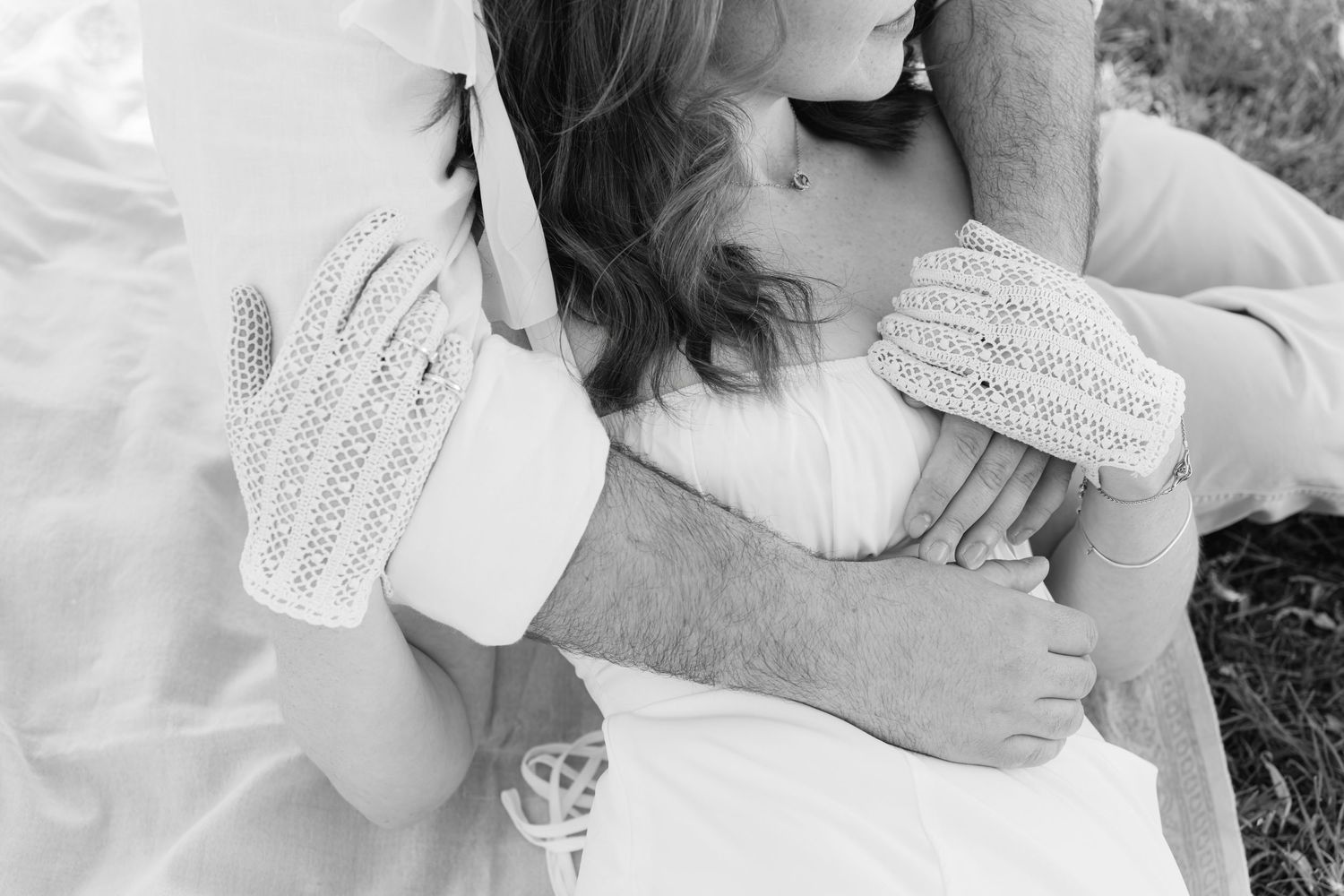 Black and white intimate photo sequence showing tender moments between two people.