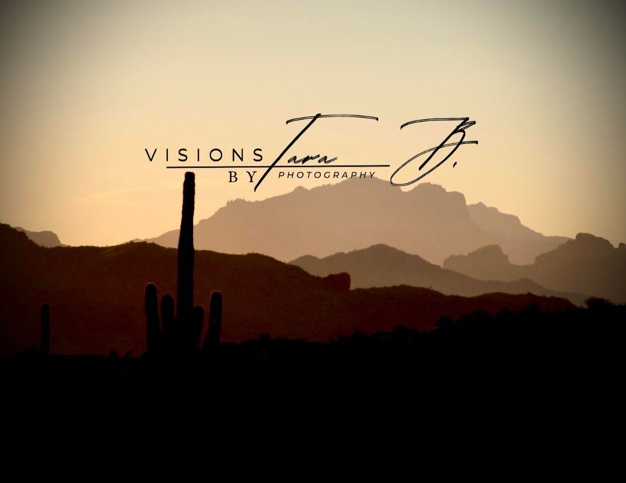 Golden desert sunset with mountain silhouettes and cactus in view.