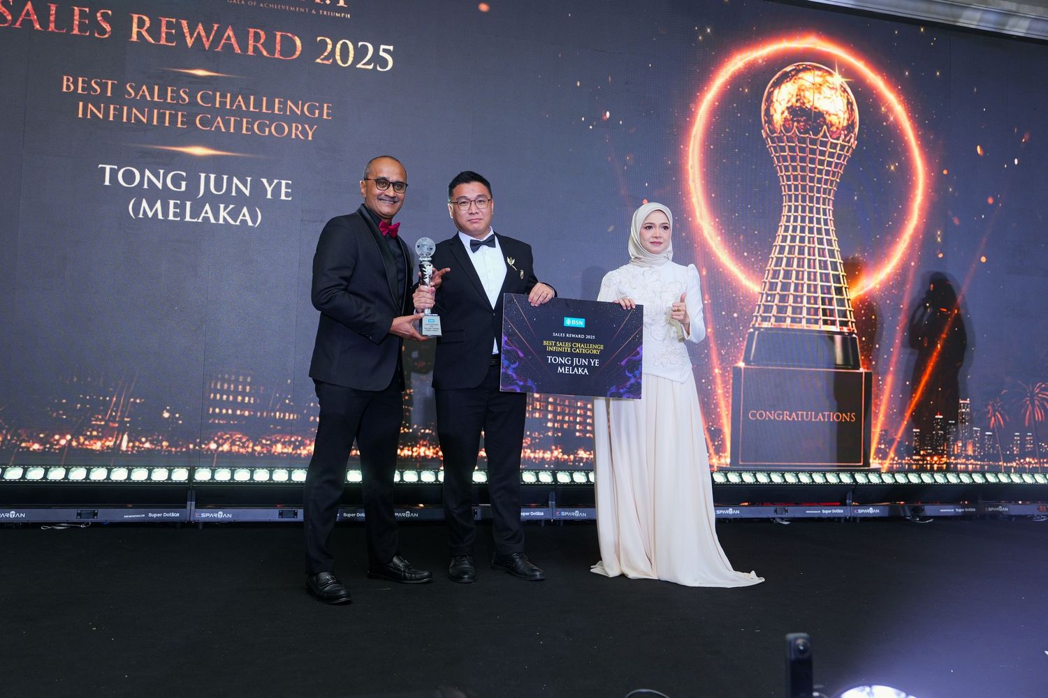 Best Sales Challenge award presentation at BSN Sales Reward 2025 ceremony in Melaka.