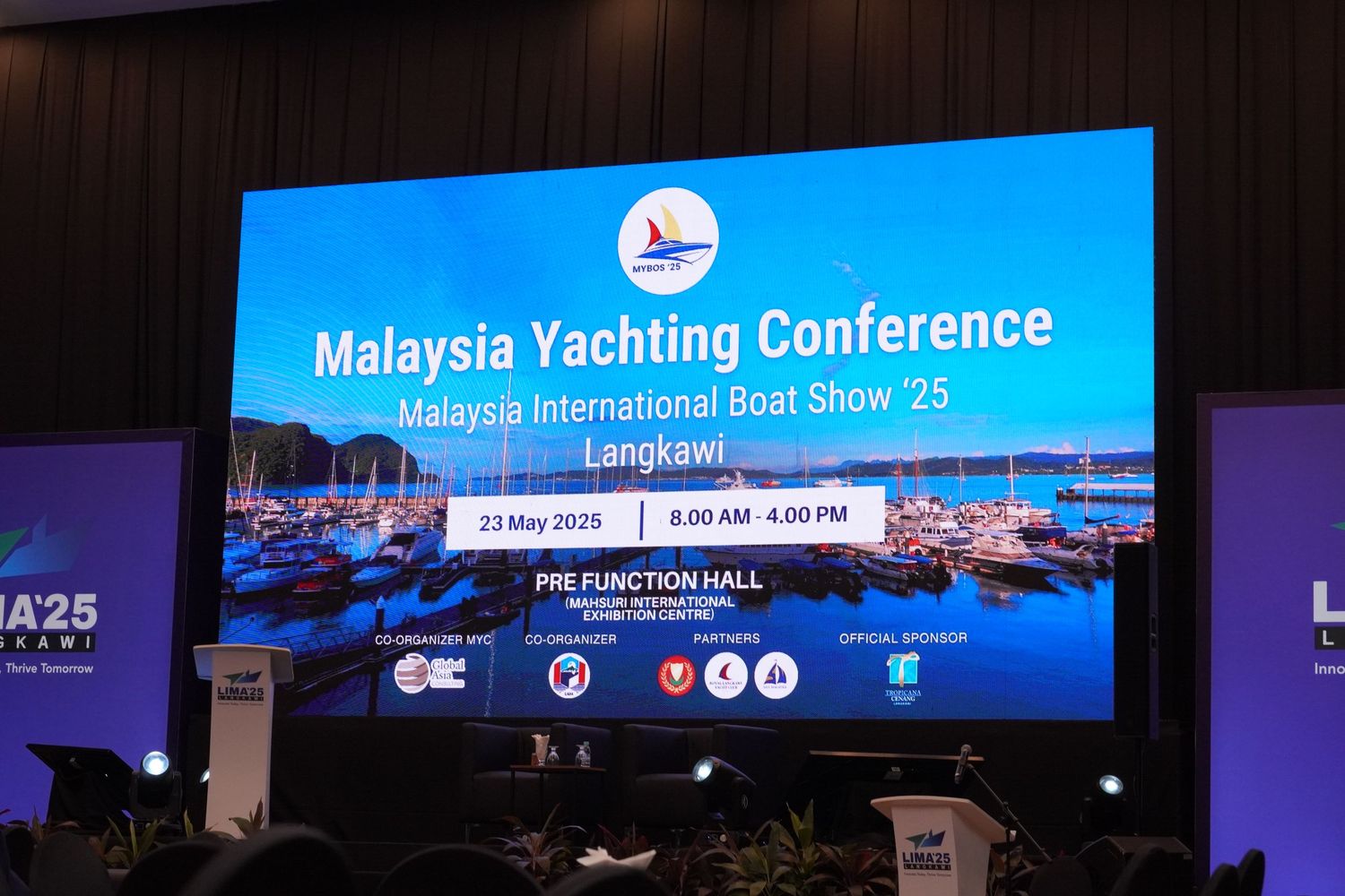 Large digital display showing Malaysia Yachting Conference and International Boat Show 25 banner against dark background.