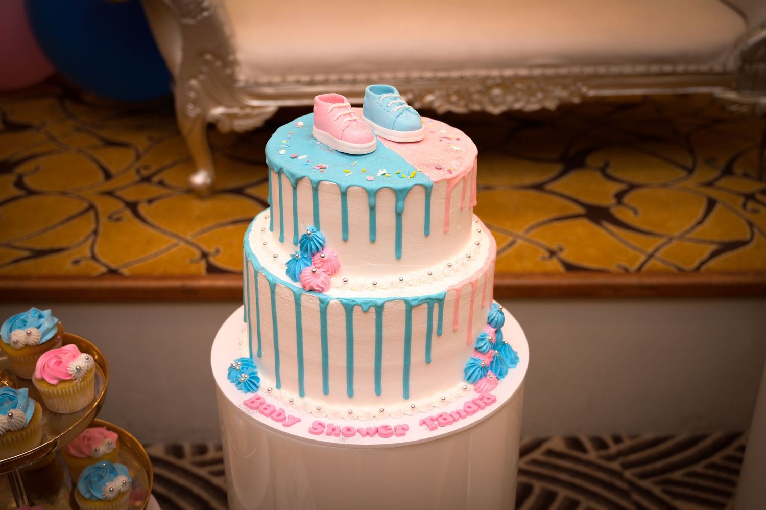 Six decorative teal and pink birthday cakes with drip designs and floral accents displayed in a photo collage.