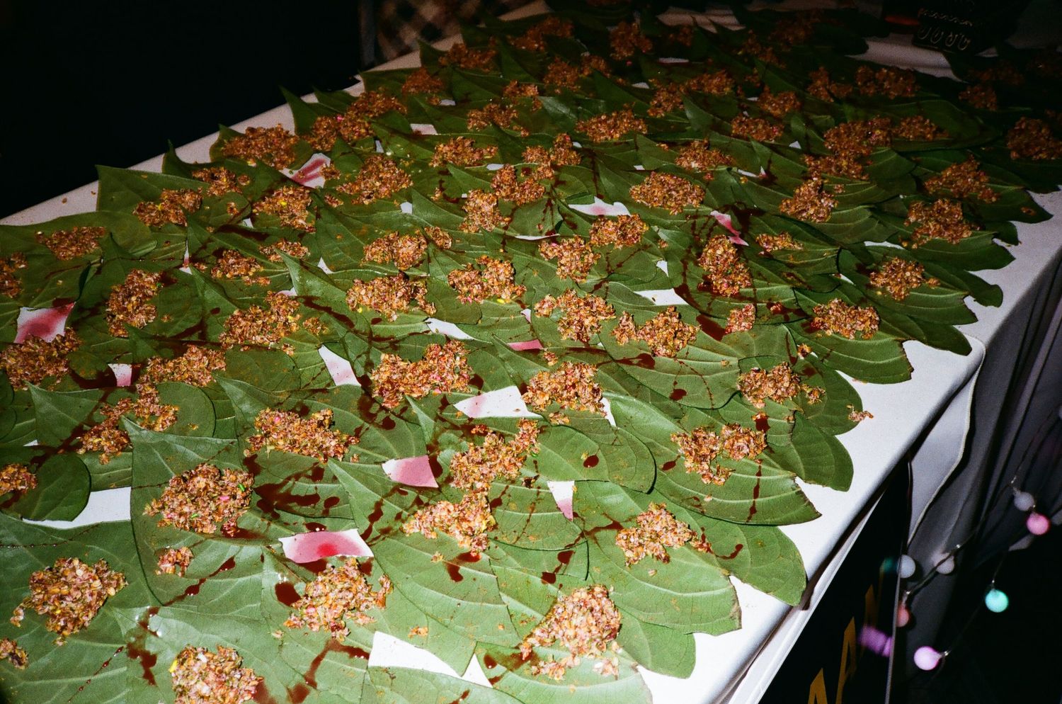 A colorful paan spread at a Muslim Desi wedding in Chicago’s adler Planetarium Pakistani/Indian sweets styled to perfection on 35mm film