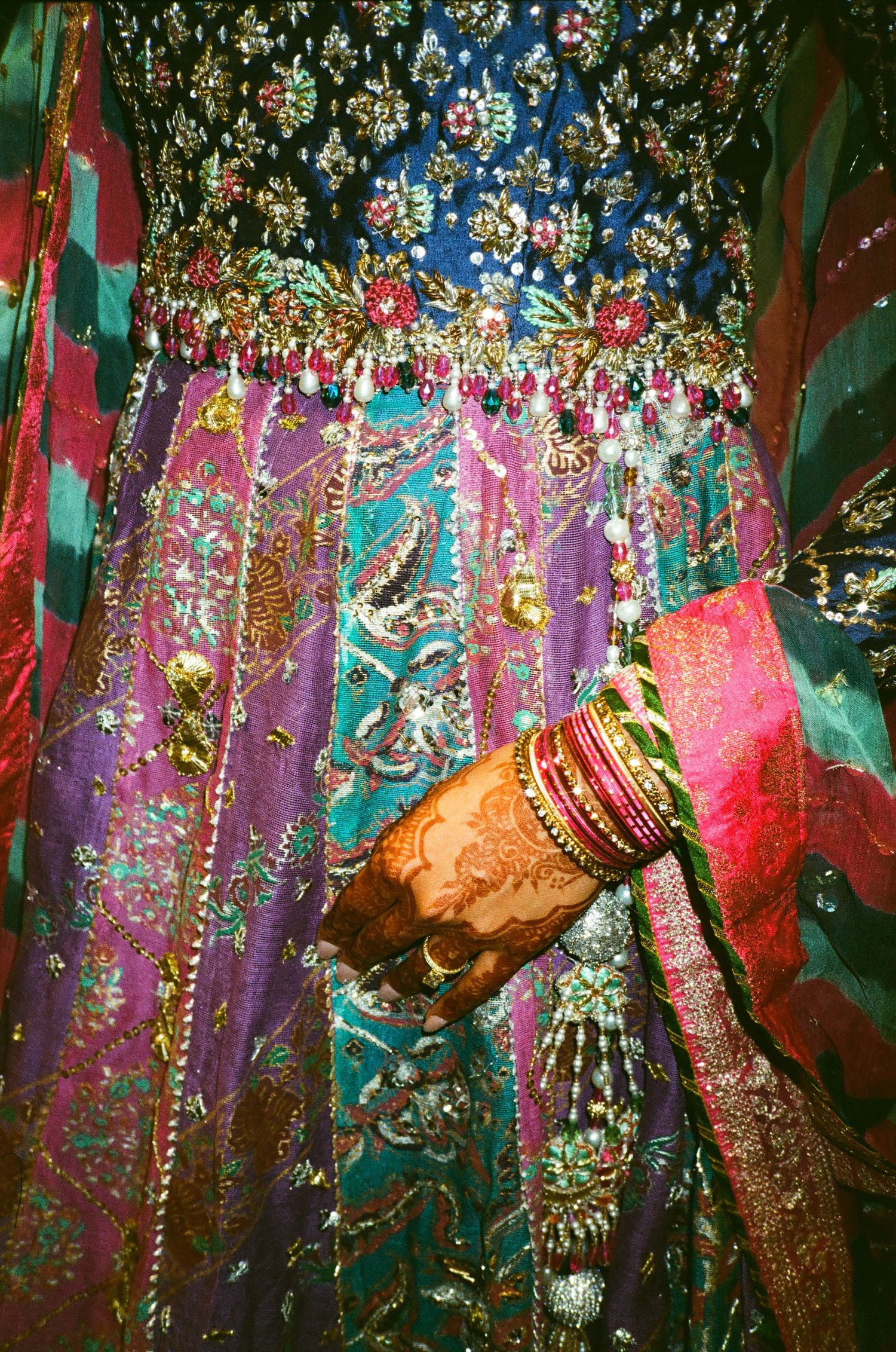 Stunning bridal mehndi gown from a pakistani designer shining vibrantly on 35mm film. the canvas venue arlington heights