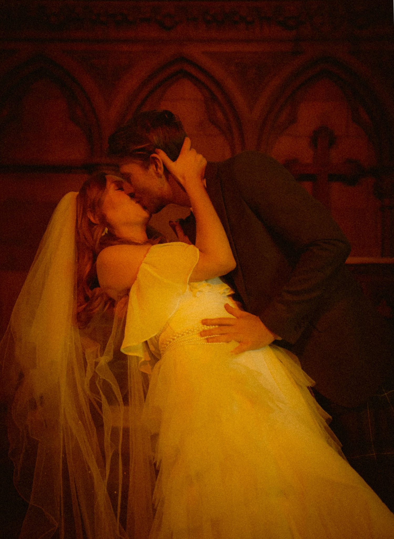 bride-and-groom-first-kiss-in-cathedral-Glasgow