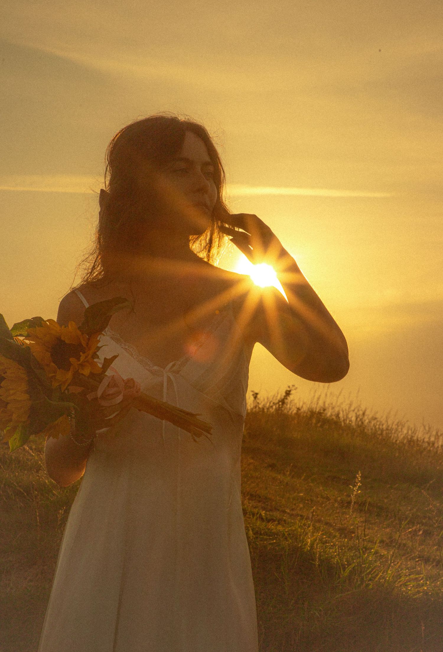 rustic-golden-hour-bride-in-front-of-sunset
