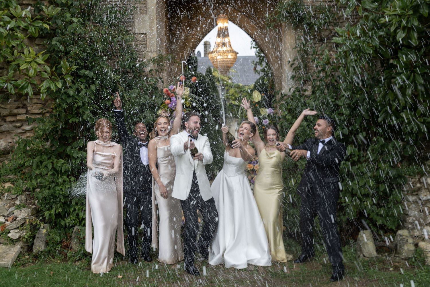 Outdoor celebration at Euridge Manor captured by Wiltshire wedding photographer Sally Gambling