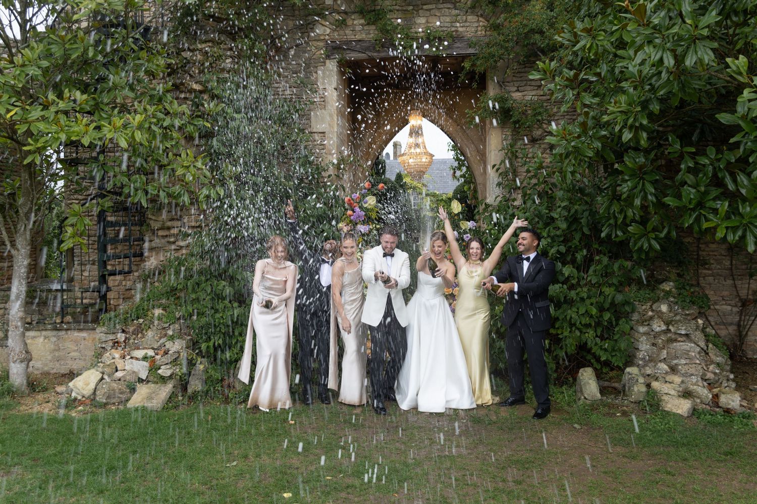 Candid moment during outdoor ceremony in Wiltshire, photographed by Wiltshire wedding photographer
