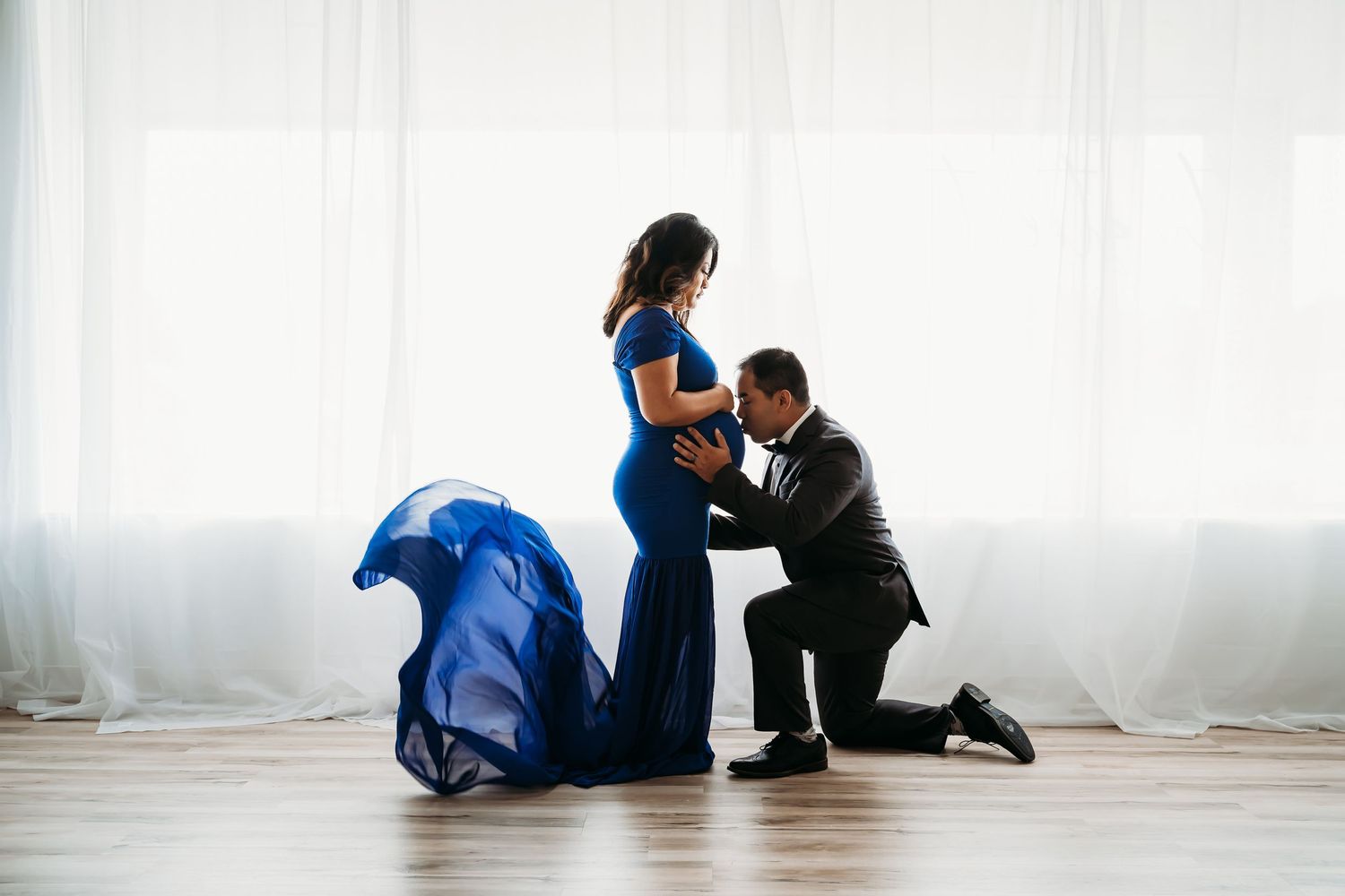 indoor studio maternity picture classy gown