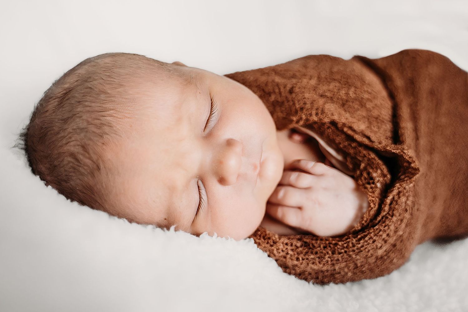 sleeping wrapped newborn baby posed picture