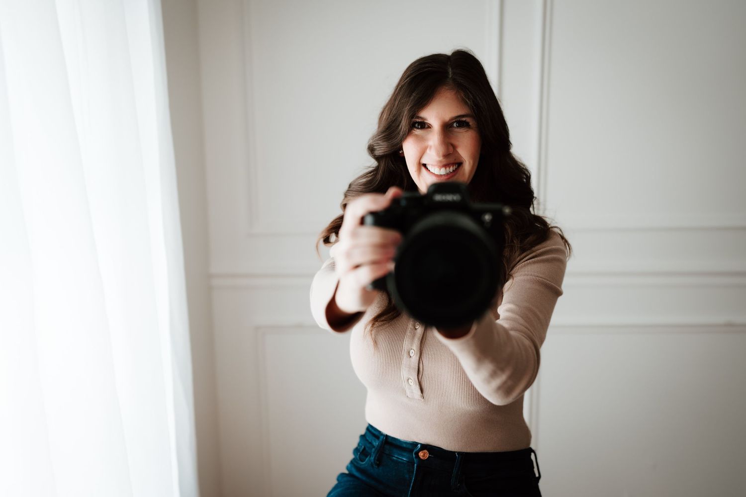 photographer headshot with camera