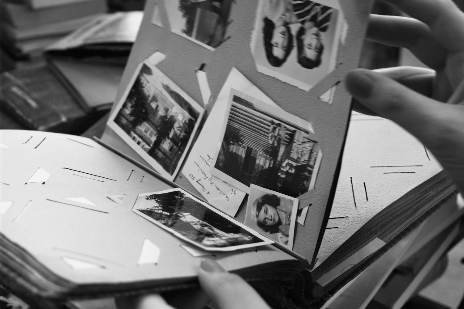 old photo album, photos are falling out