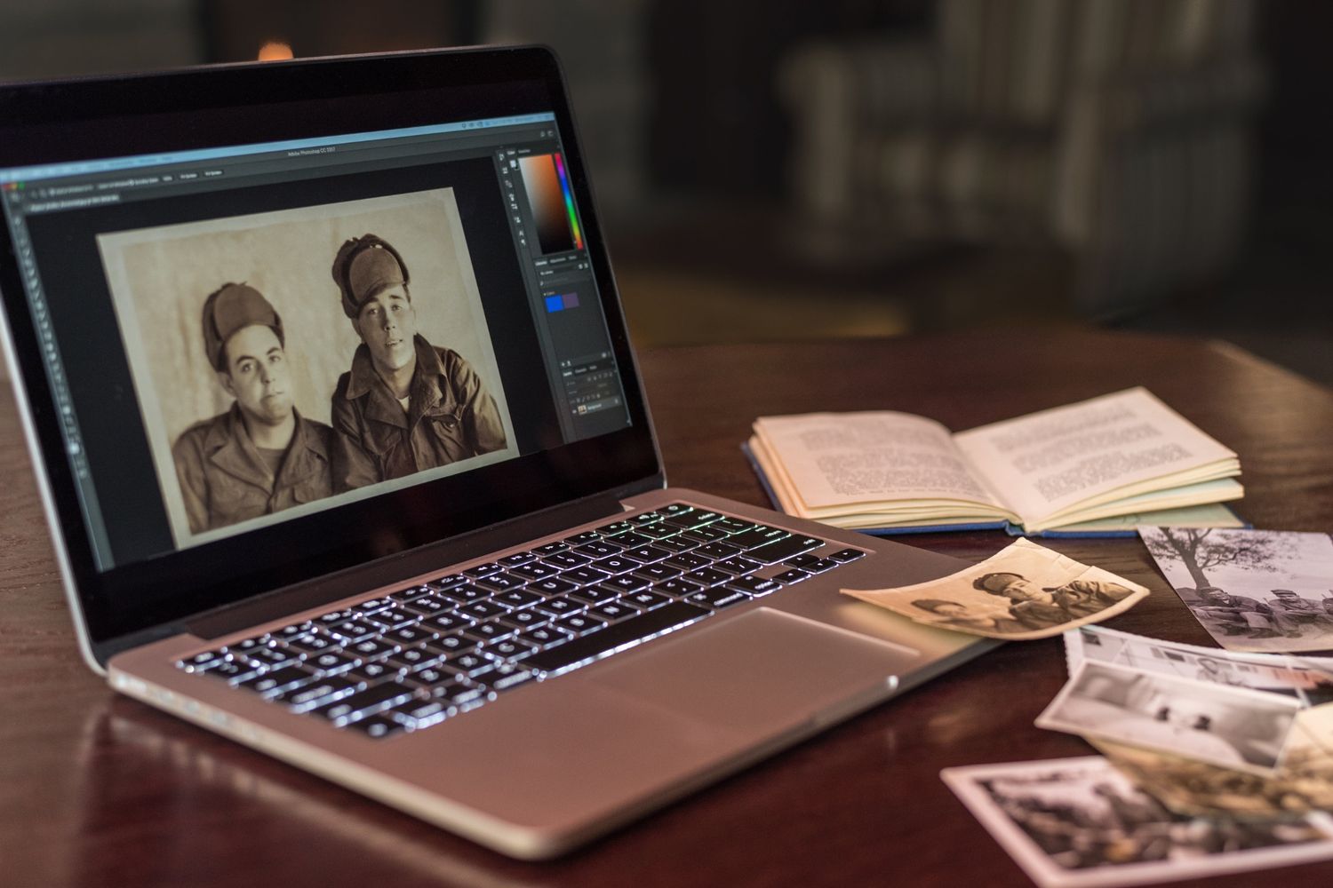Laptop with scanned old photo showing on screen
