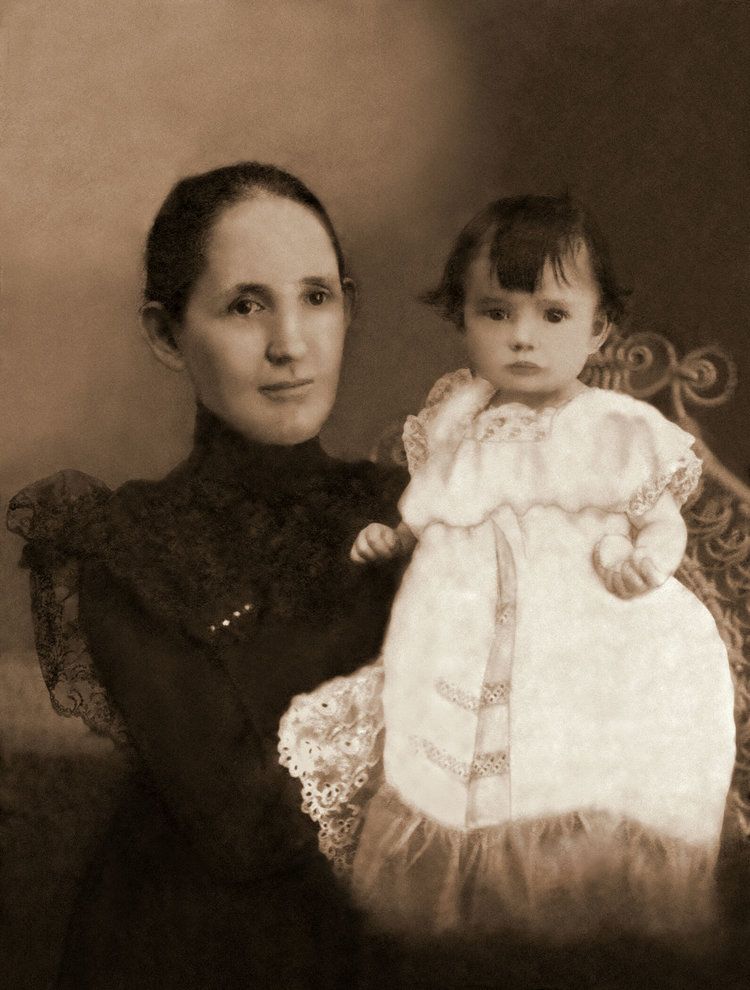 Digitally restored photo of mother and baby