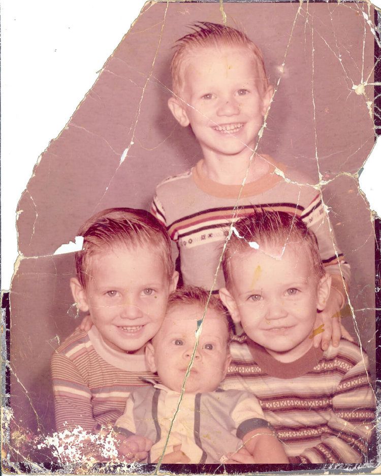 Damage photo of 3 boys
