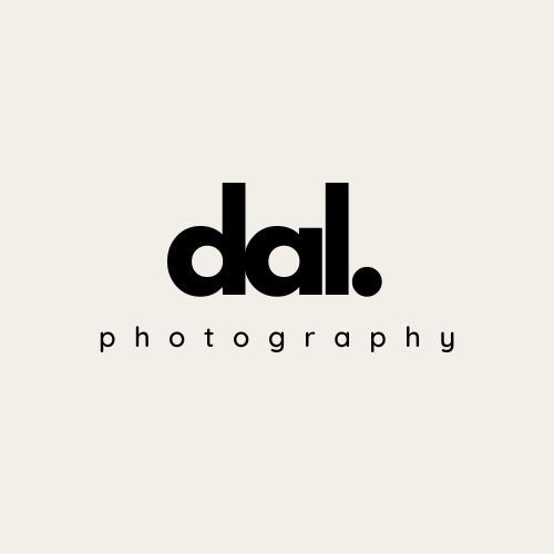 Minimalist black photography logo design with 'dal.' text and 'photography' subtitle on beige background.