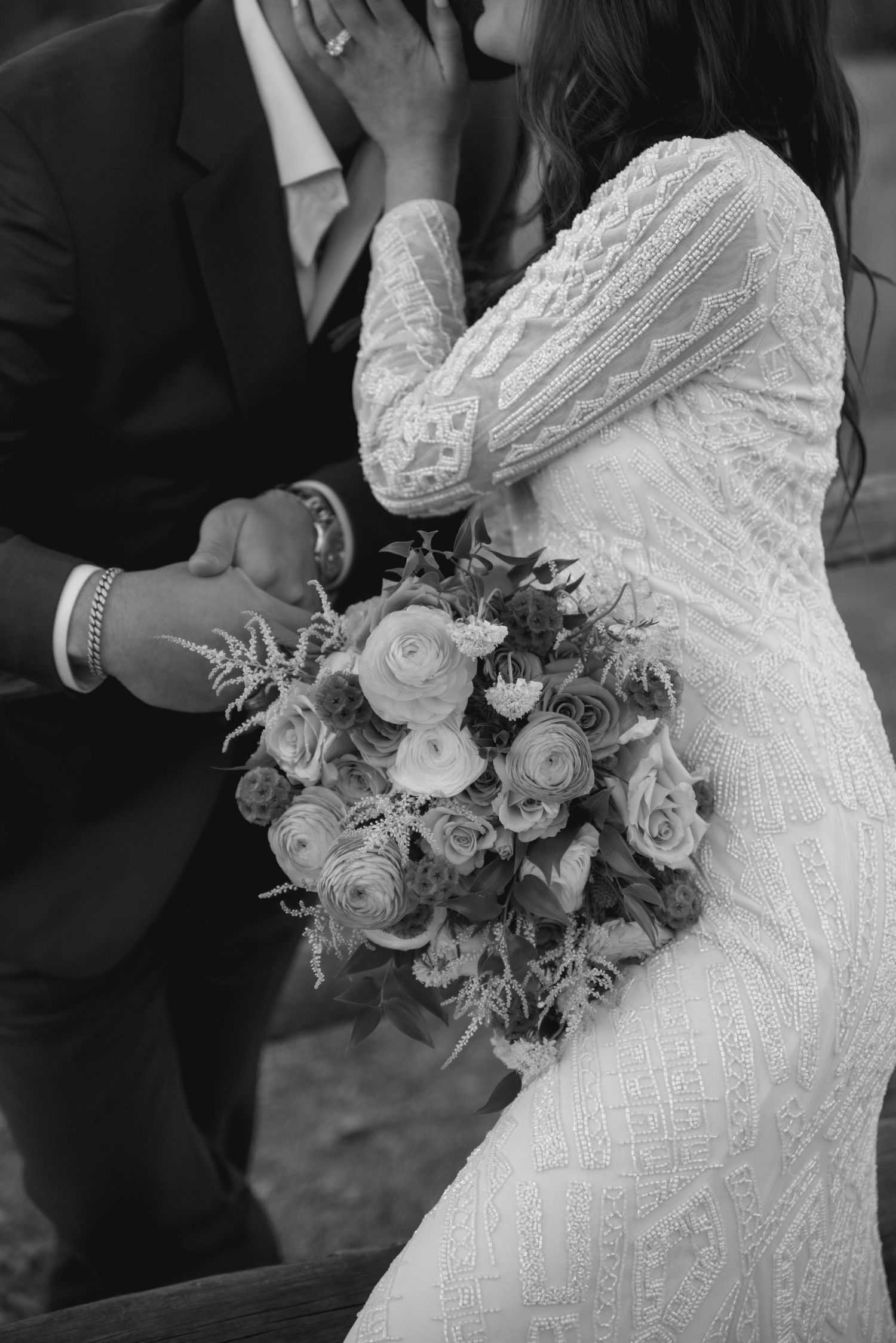 A series of elegant wedding bouquets featuring white roses and greenery against a black and white background.